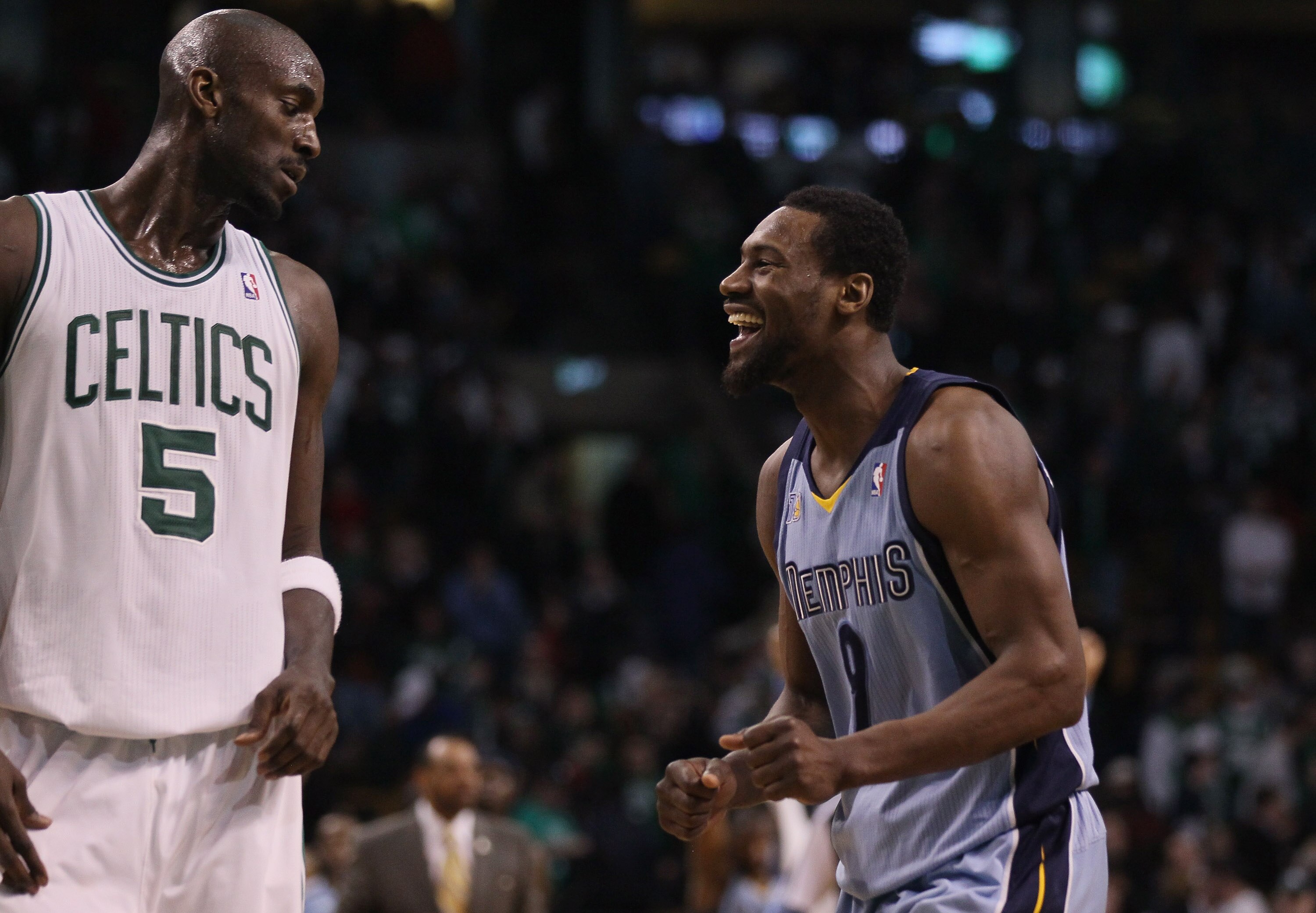 BOSTON, MA - MARCH 23:  Tony Allen #9 of the Memphis Grizzlies celebrates the win at the buzzer as Kevin Garnett #5 of the Boston Celtics stands by on March 23, 2011 at the TD Garden in Boston, Massachusetts.  The Memphis Grizzlies defeated the Boston Cel