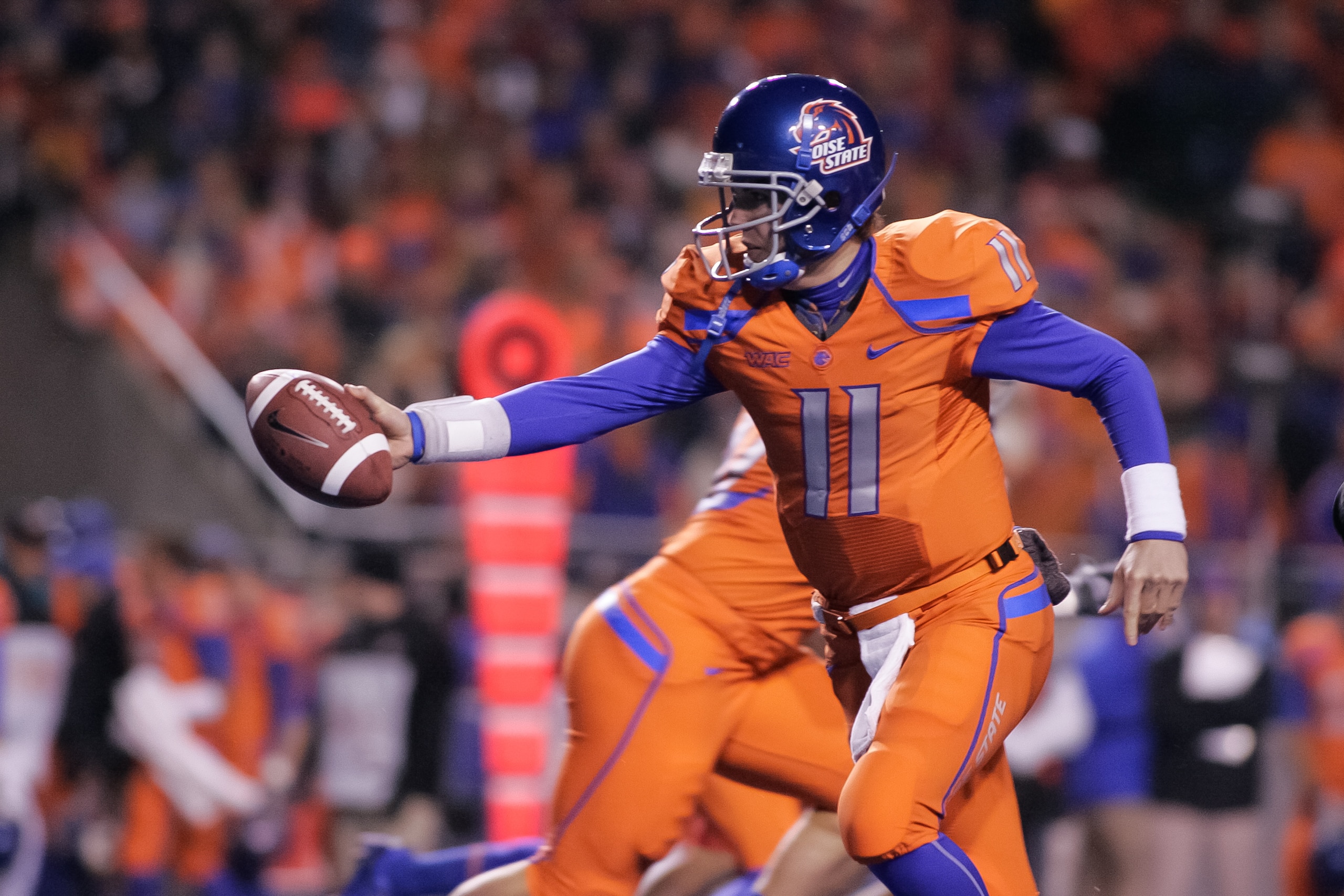 BOISE, ID - NOVEMBER 19: Kellen Moore #11 of the Boise State Broncos hands off the ball against the Fresno State Bulldogs at Bronco Stadium on November 19, 2010 in Boise, Idaho. (Photo by Otto Kitsinger III/Getty Images) BOISE, ID - NOVEMBER 19: Kellen Moore #11 of the Boise State Broncos hands off the ball against the Fresno State Bulldogs at Bronco Stadium on November 19, 2010 in Boise, Idaho. (Photo by Otto Kitsinger III/Getty Images)