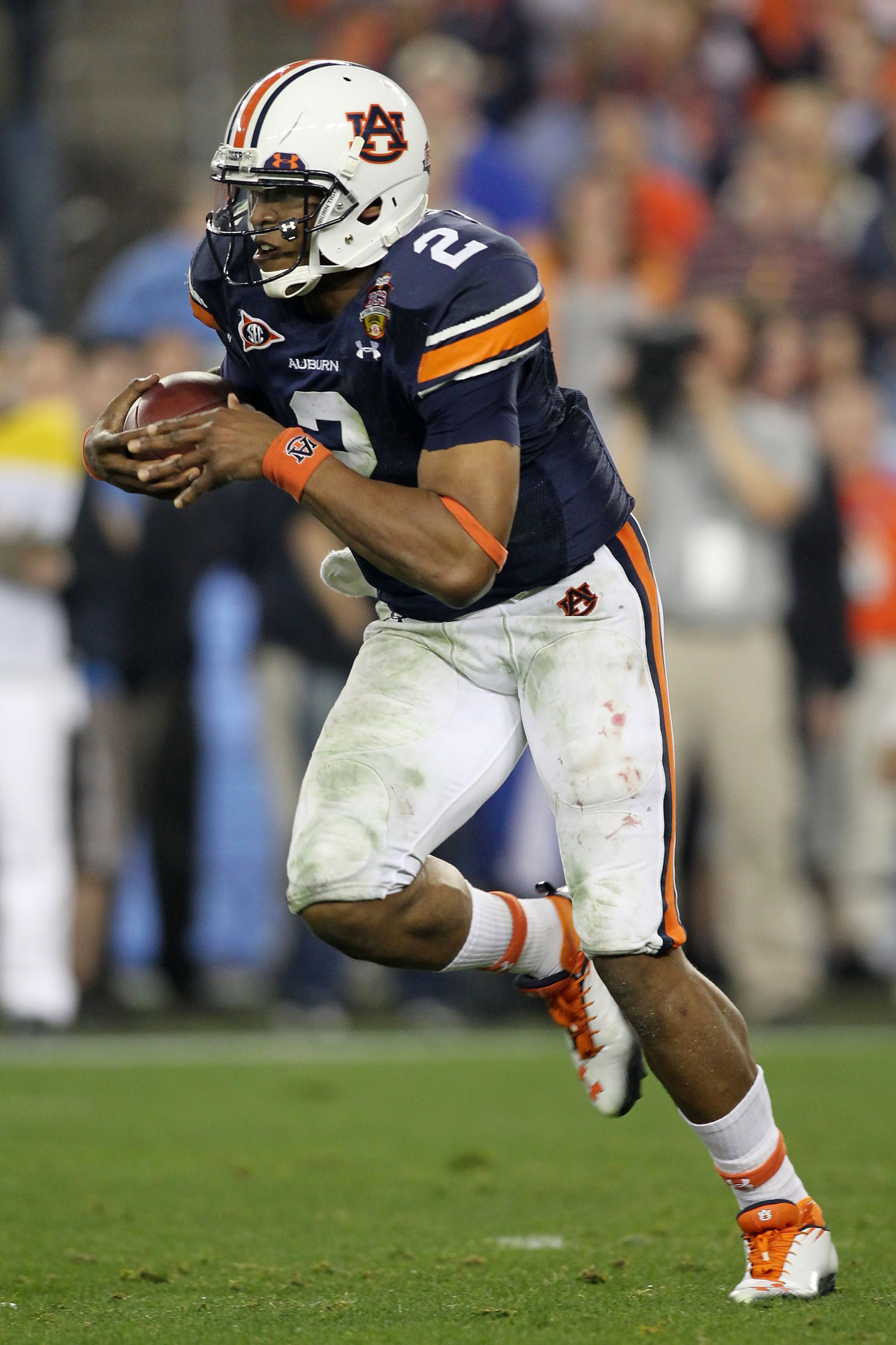 GLENDALE, AZ - JANUARY 10: Cameron Newton #2 of the Auburn Tigers runs down field against the Oregon Ducks during the Tostitos BCS National Championship Game at University of Phoenix Stadium on January 10, 2011 in Glendale, Arizona. (Photo by Jonathan F GLENDALE, AZ - JANUARY 10: Cameron Newton #2 of the Auburn Tigers runs down field against the Oregon Ducks during the Tostitos BCS National Championship Game at University of Phoenix Stadium on January 10, 2011 in Glendale, Arizona. (Photo by Jonathan F