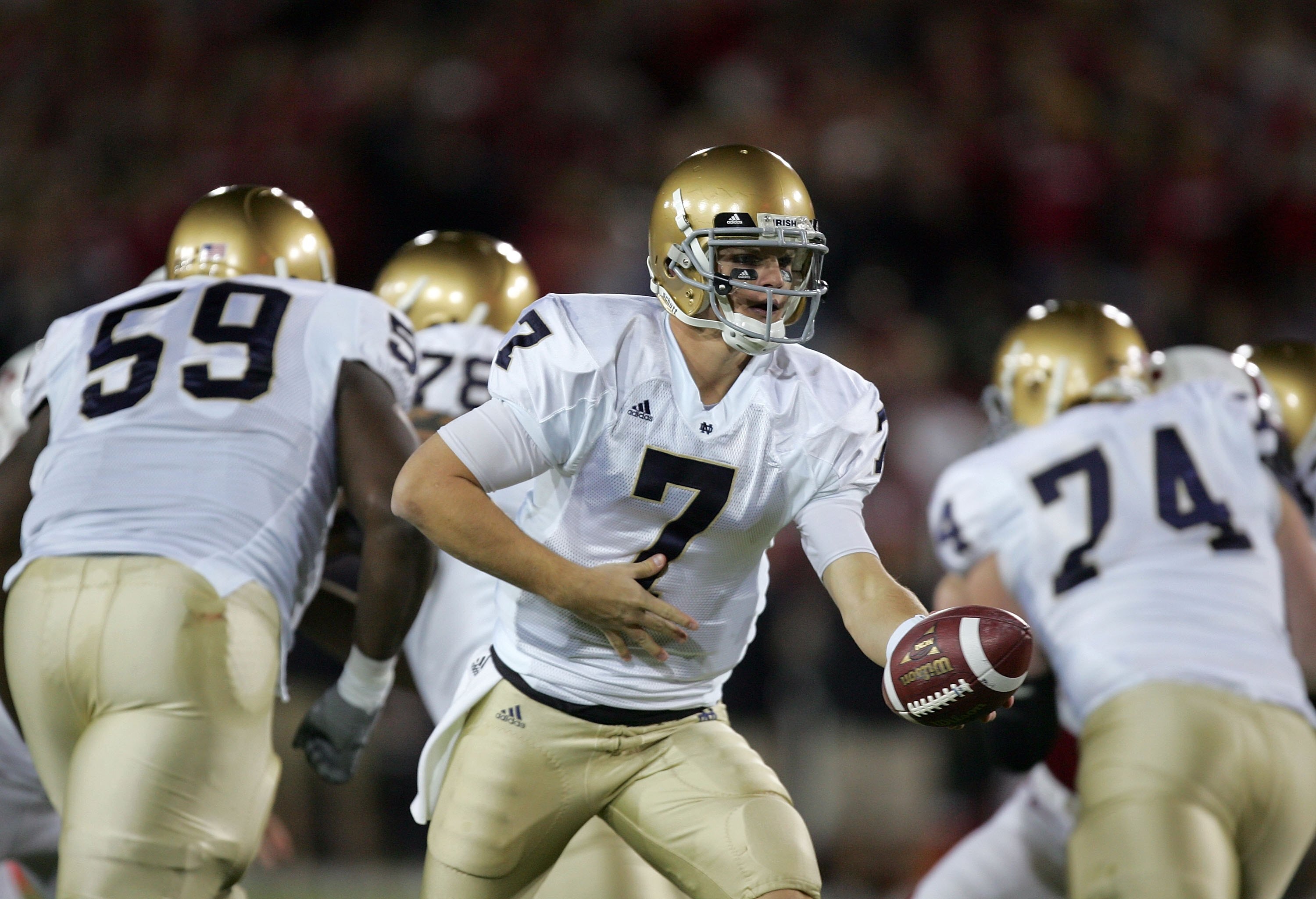 PALO ALTO, CA - NOVEMBER 28:  Jimmy Clausen #7 of the Notre Dame Fighting Irish in action during their game against the Stanford Cardinal at Stanford Stadium on November 28, 2009 in Palo Alto, California.  (Photo by Ezra Shaw/Getty Images)