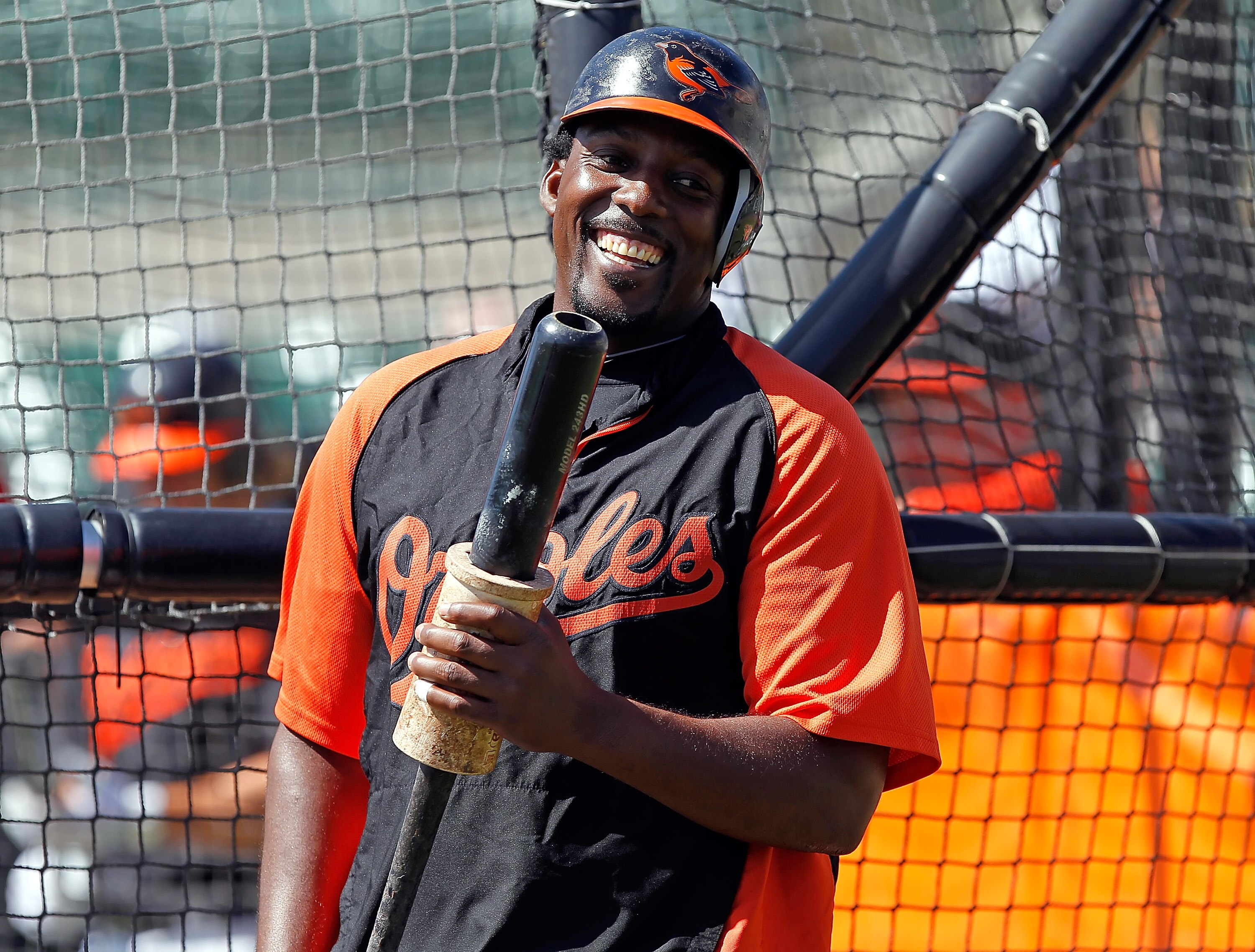SARASOTA, FL - MARCH 03:  Designated hitter Vladimir Guerrero #27 of the Baltimore Orioles smiles during batting practice just before the Grapefruit League Spring Training Game against the Minnesota Twins at Ed Smith Stadium on March 3, 2011 in Sarasota,