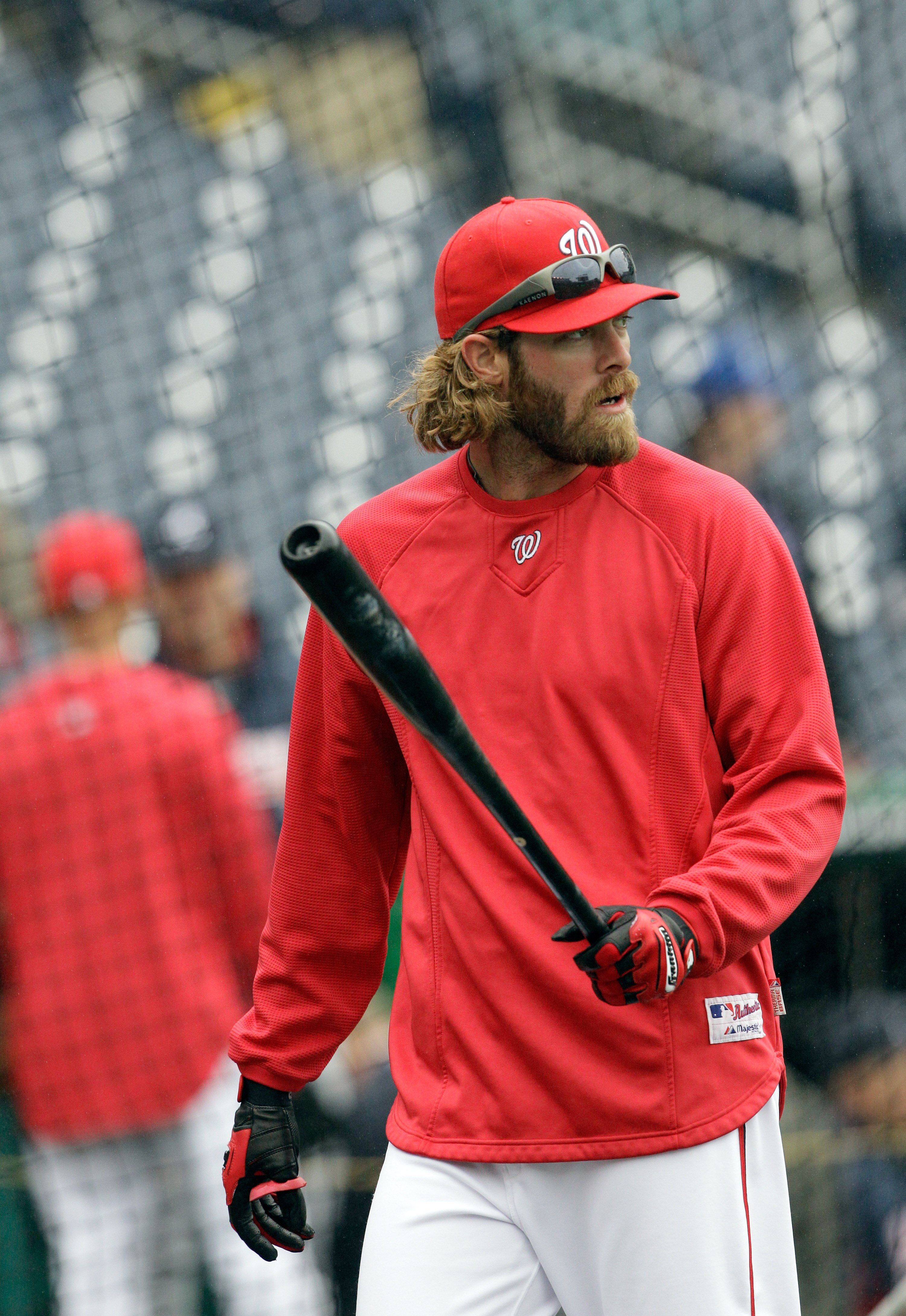 WASHINGTON, DC - MARCH 31:  Jayson Werth #28 of the Washington Nationals warms up while taking batting practice before their opening day game against the Atlanta Braves at Nationals Park on March 31, 2011 in Washington, DC.  (Photo by Rob Carr/Getty Image