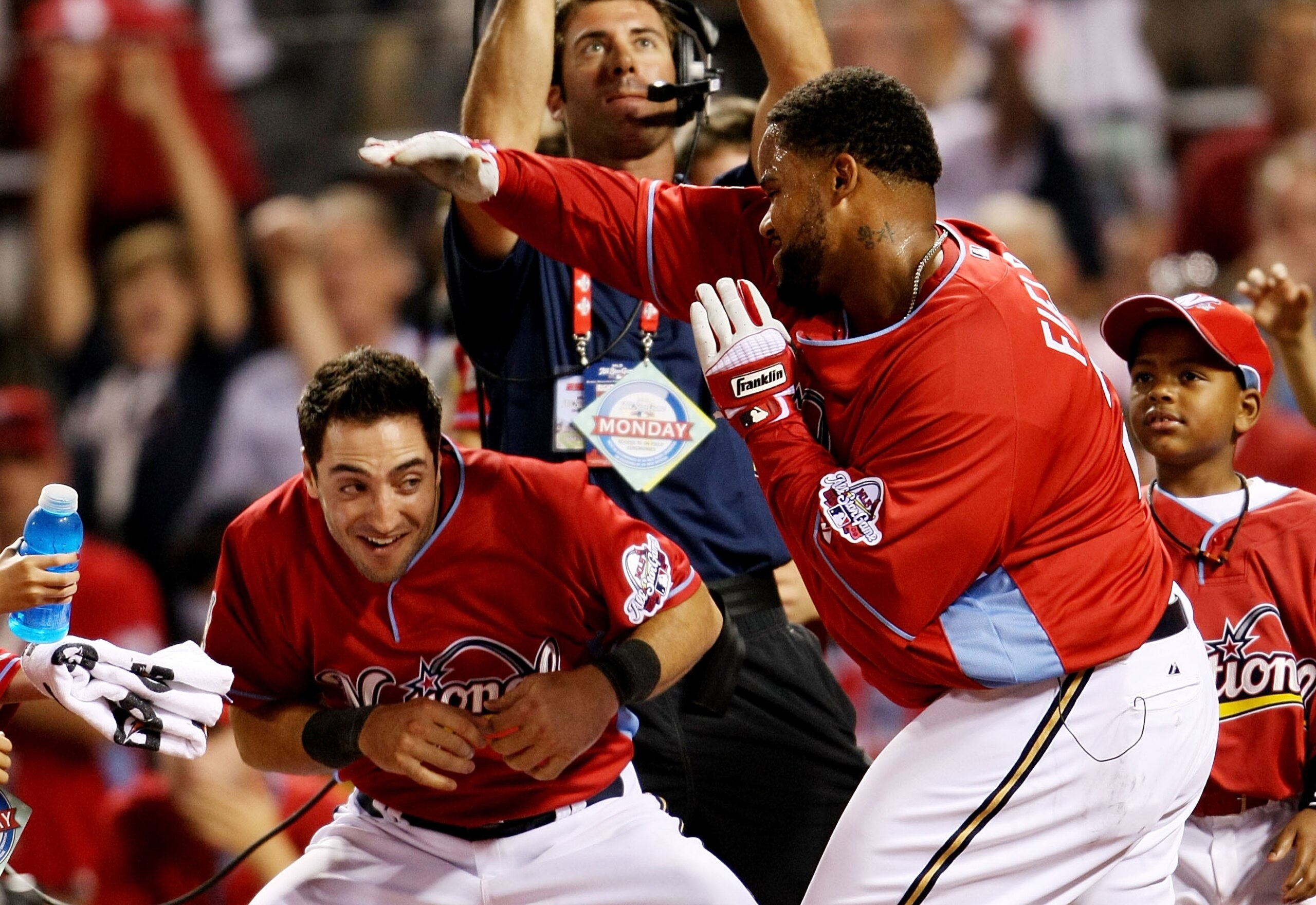 ST LOUIS, MO - JULY 13:  National League All-Star Prince Fielder of the Milwaukee Brewers celebrates with teammate Ryan Braun after winning the State Farm Home Run Derby at Busch Stadium on July 13, 2009 in St. Louis, Missouri.  (Photo by Elsa/Getty Image