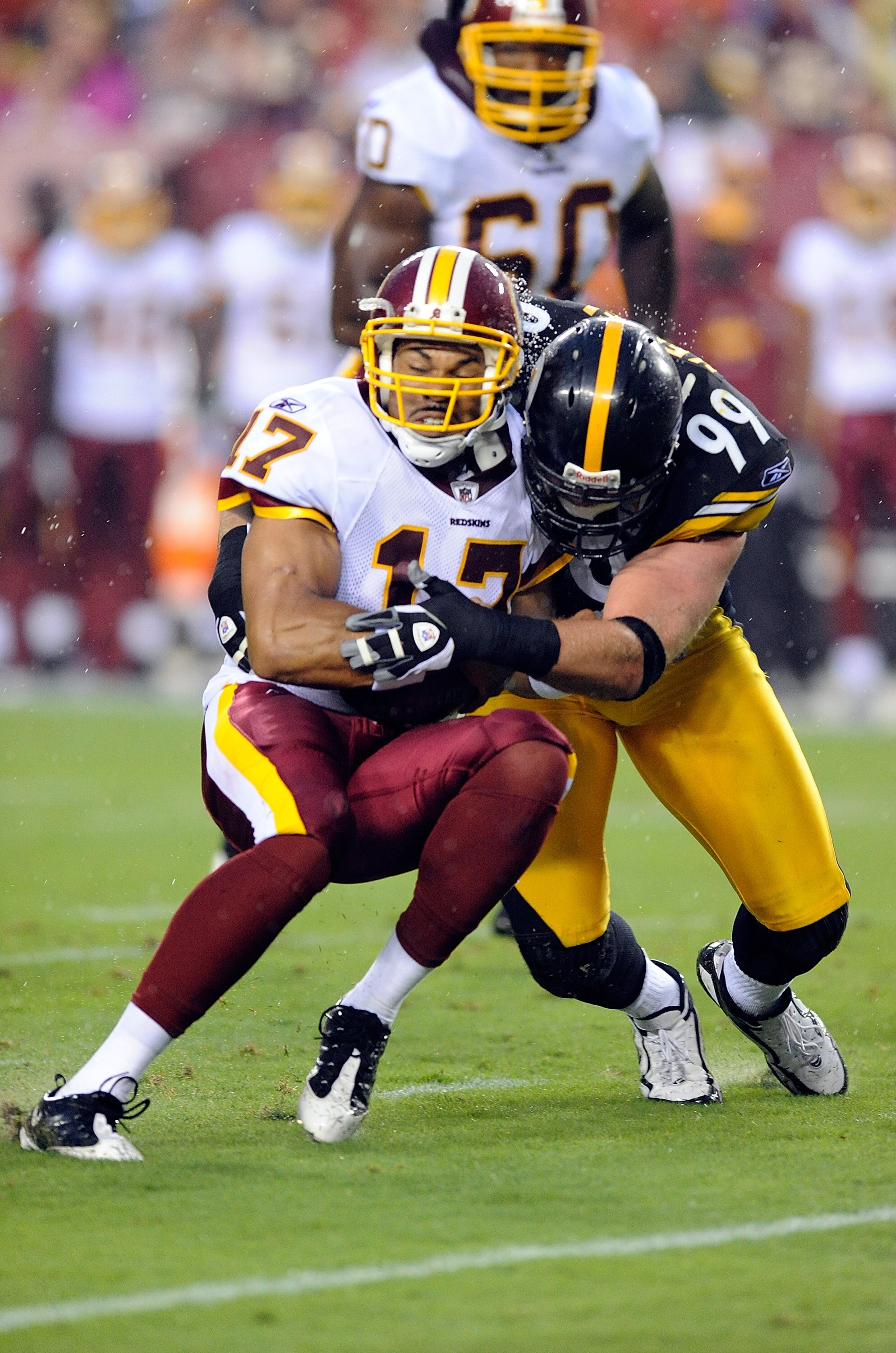 LANDOVER, MD - AUGUST 22:  Jason Campbell #17 of the Washington Redskins is tackled by Brett Keisel #99 of the Pittsburgh Steelers at Fed Ex Field on August 22, 2009 in Landover, Maryland.  (Photo by Greg Fiume/Getty Images)