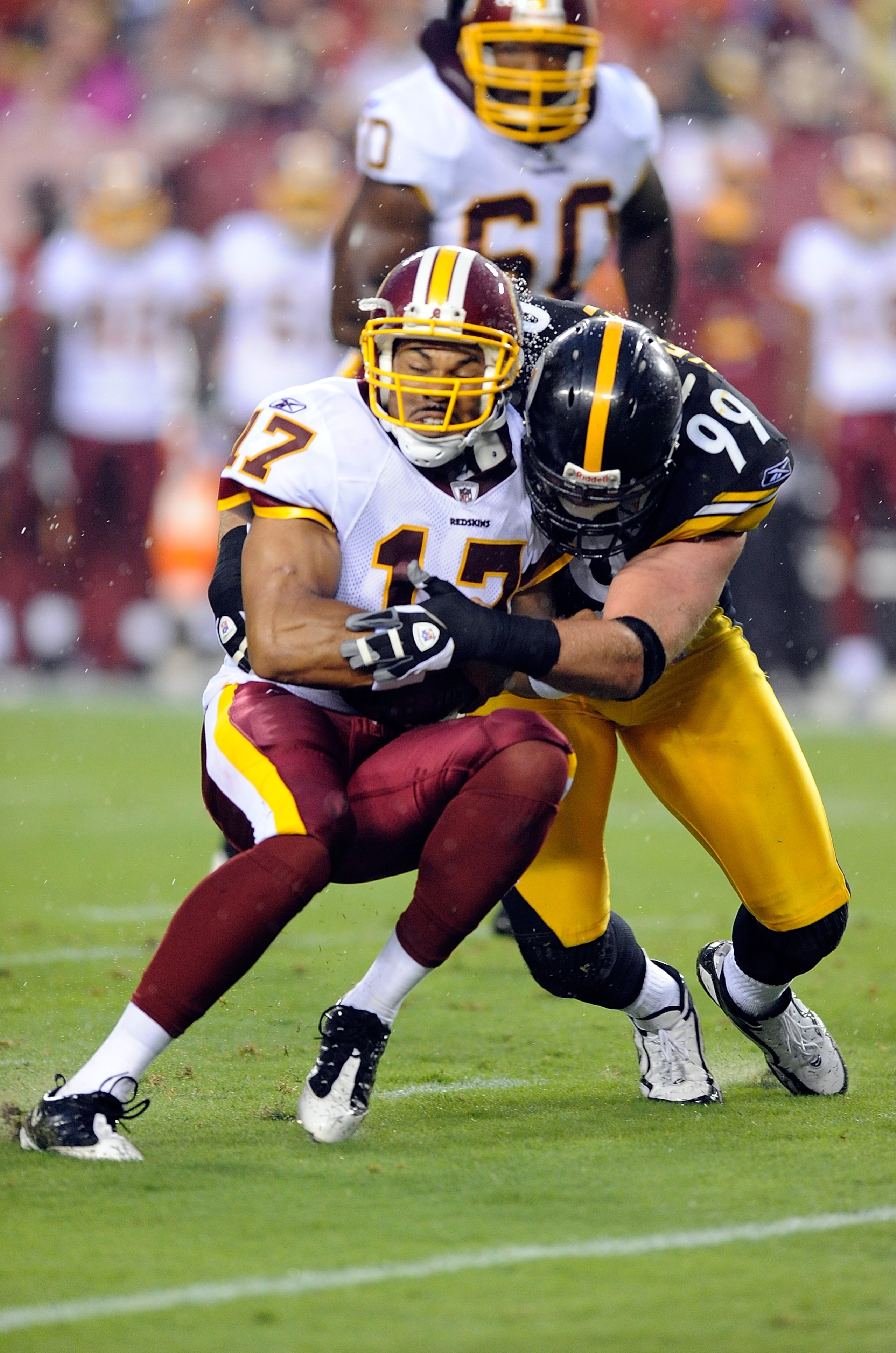 LANDOVER, MD - AUGUST 22:  Jason Campbell #17 of the Washington Redskins is tackled by Brett Keisel #99 of the Pittsburgh Steelers at Fed Ex Field on August 22, 2009 in Landover, Maryland.  (Photo by Greg Fiume/Getty Images)
