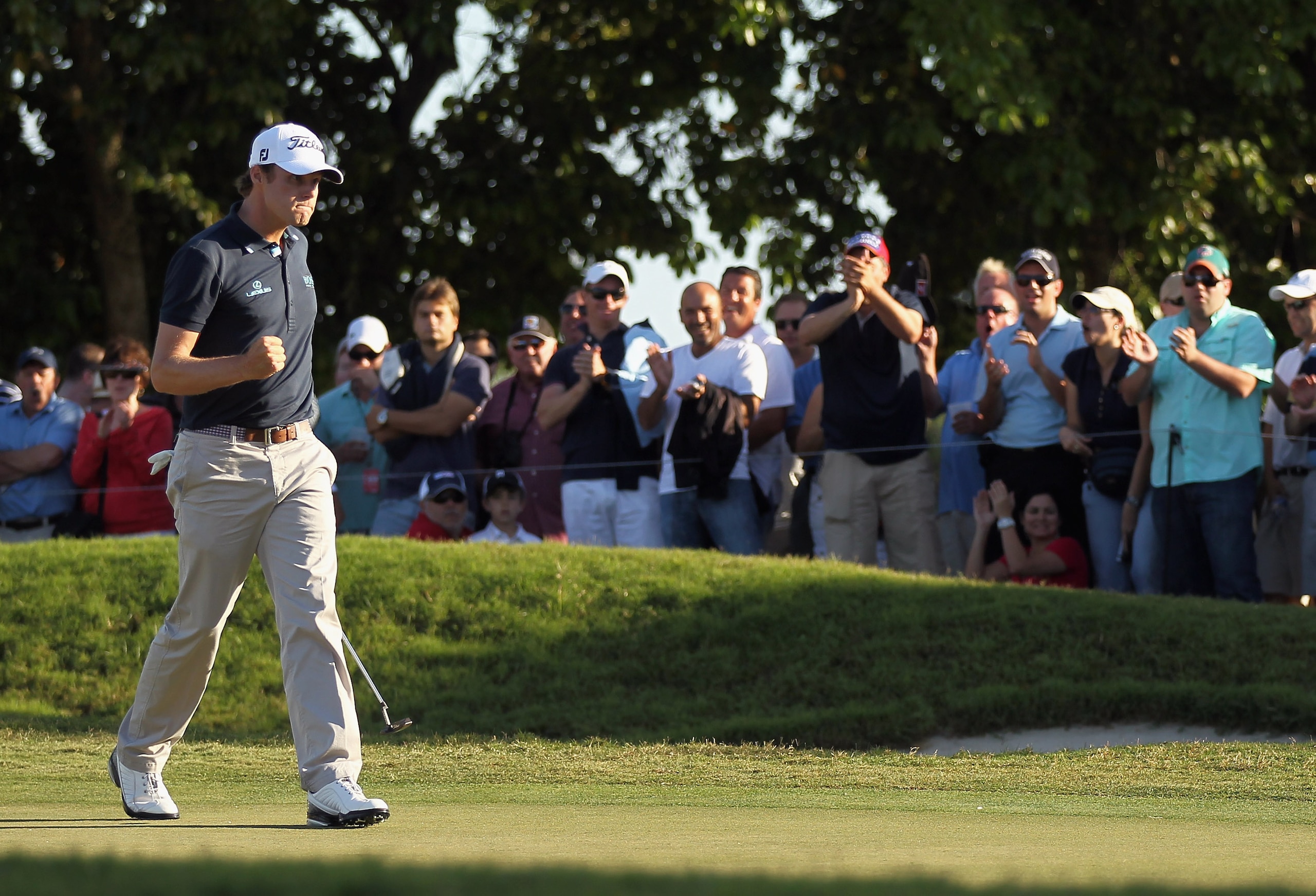 DORAL, FL - MARCH 13: Nick Watney celebrates his par saving putt on the 15th green during the final round of the 2011 WGC- Cadillac Championship at the TPC Blue Monster at the Doral Golf Resort and Spa on March 13, 2011 in Doral, Florida. (Photo by Mike DORAL, FL - MARCH 13: Nick Watney celebrates his par saving putt on the 15th green during the final round of the 2011 WGC- Cadillac Championship at the TPC Blue Monster at the Doral Golf Resort and Spa on March 13, 2011 in Doral, Florida. (Photo by Mike