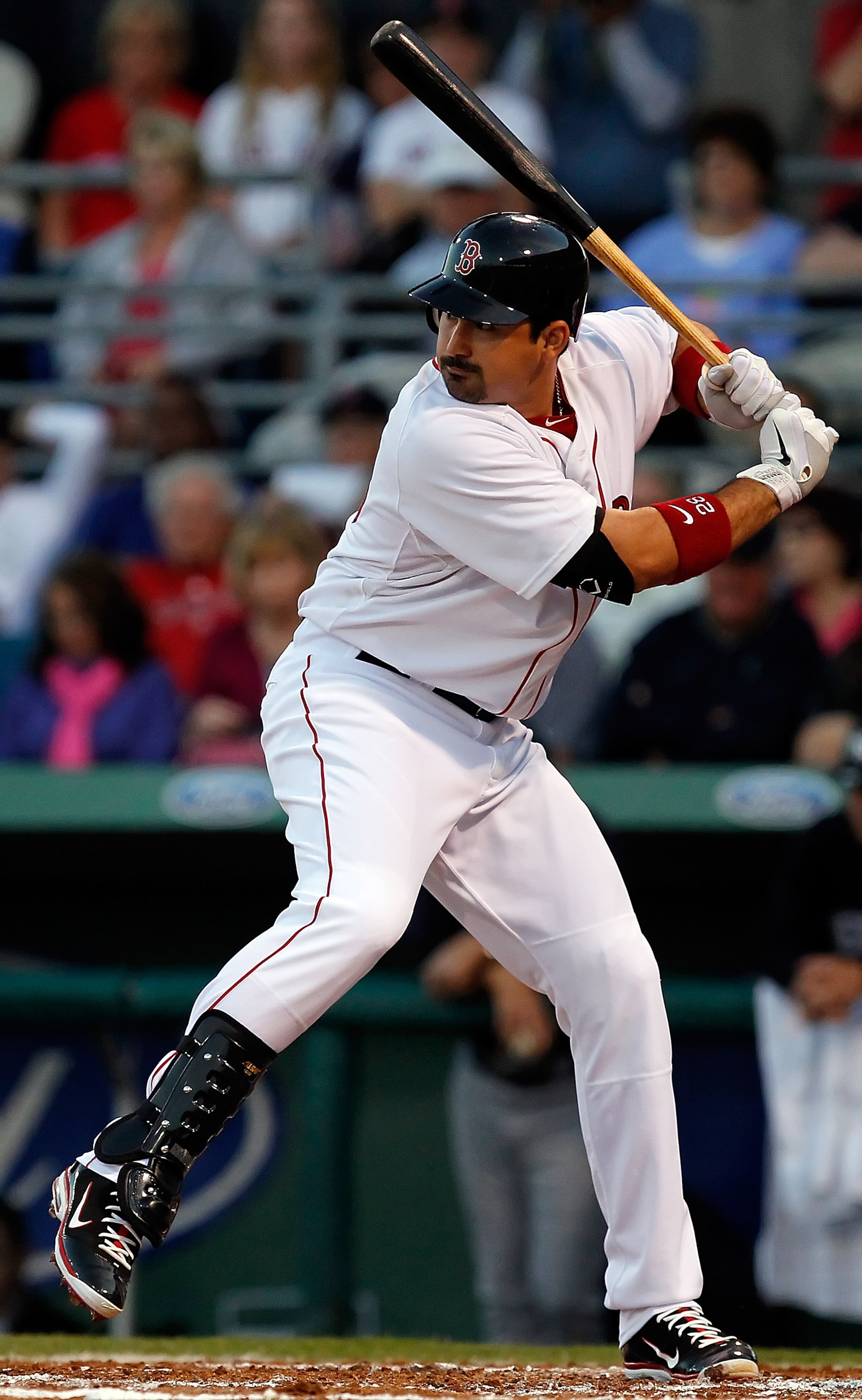 FORT MYERS, FL - MARCH 14: Infielder Adrian Gonzalez #28 of the Boston Red Sox bats against the New York Yankees during a Grapefruit League Spring Training Game at City of Palms Park on March 14, 2011 in Fort Myers, Florida. (Photo by J. Meric/Getty Ima FORT MYERS, FL - MARCH 14: Infielder Adrian Gonzalez #28 of the Boston Red Sox bats against the New York Yankees during a Grapefruit League Spring Training Game at City of Palms Park on March 14, 2011 in Fort Myers, Florida. (Photo by J. Meric/Getty Ima
