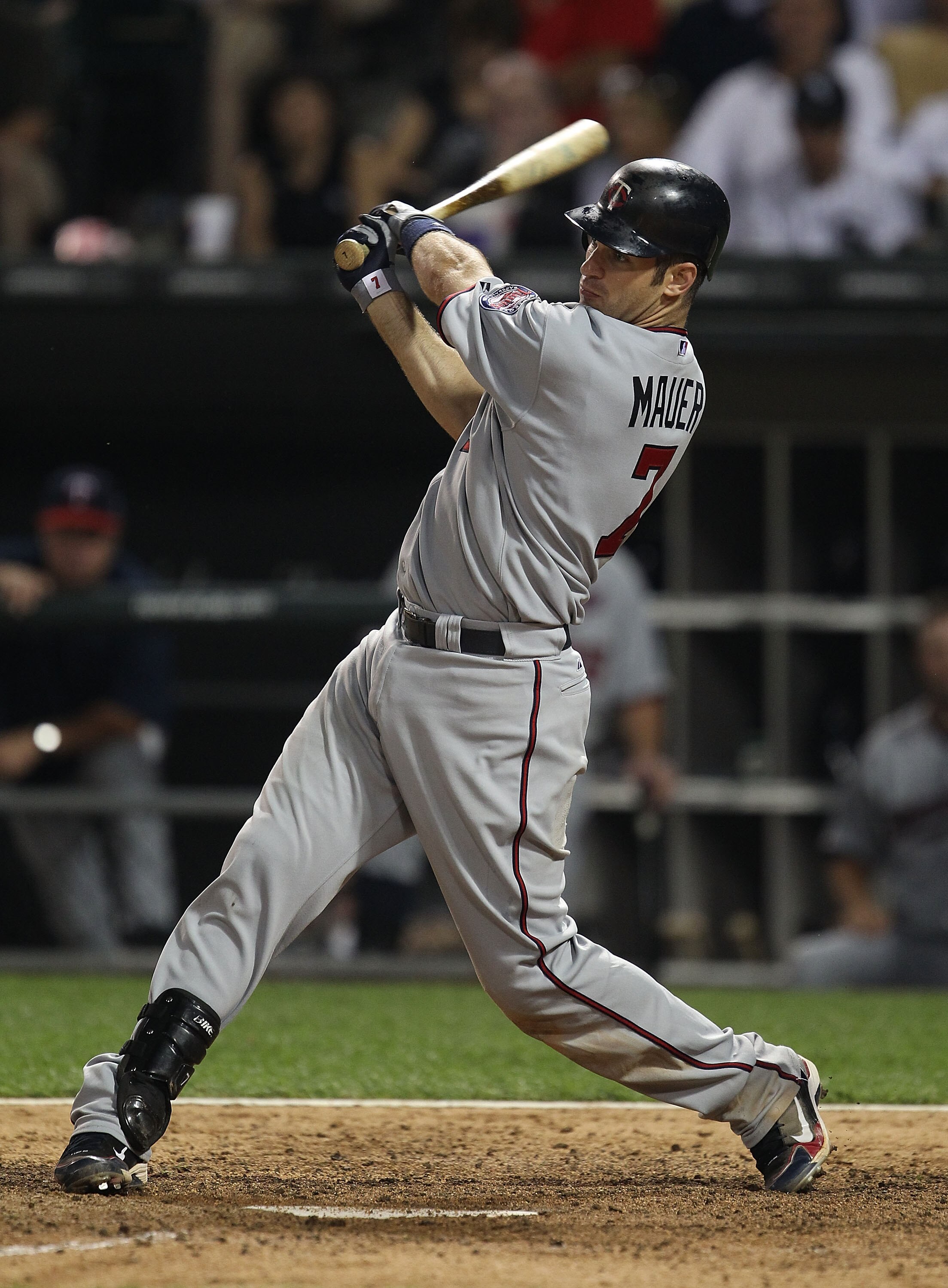 CHICAGO - AUGUST 10: Joe Mauer #7 of the Minnesota Twins takes a swing against the Chicago White Sox at U.S. Cellular Field on August 10, 2010 in Chicago, Illinois. The Twins defeated the White Sox 12-6. (Photo by Jonathan Daniel/Getty Images)