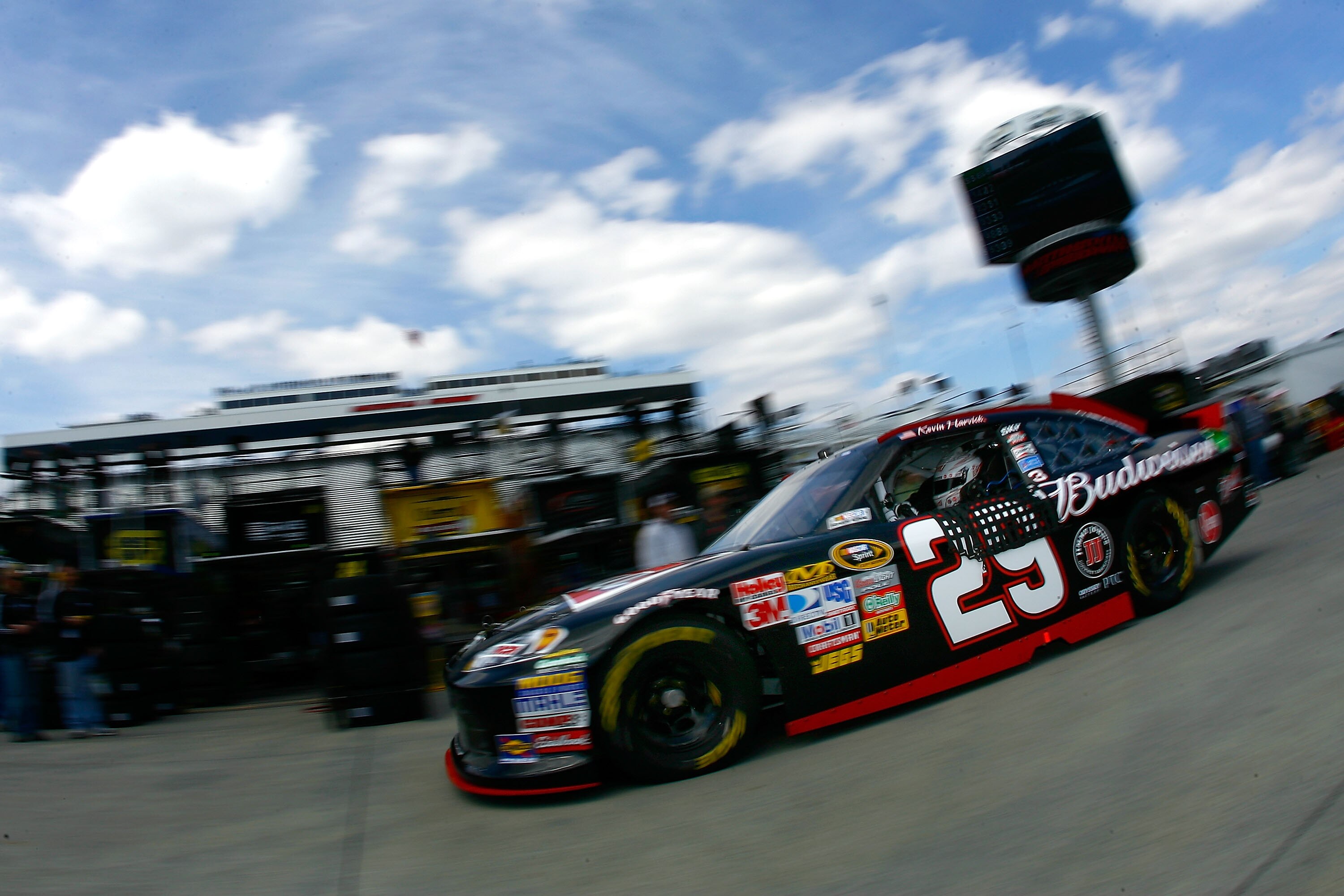 MARTINSVILLE, VA - APRIL 01:  Kevin Harvick drives the #29 Budweiser Chevrolet through the garage area during practice for the NASCAR Sprint Cup Series Goody's Fast Relief 500 at Martinsville Speedway on April 1, 2011 in Martinsville, Virginia.  (Photo by