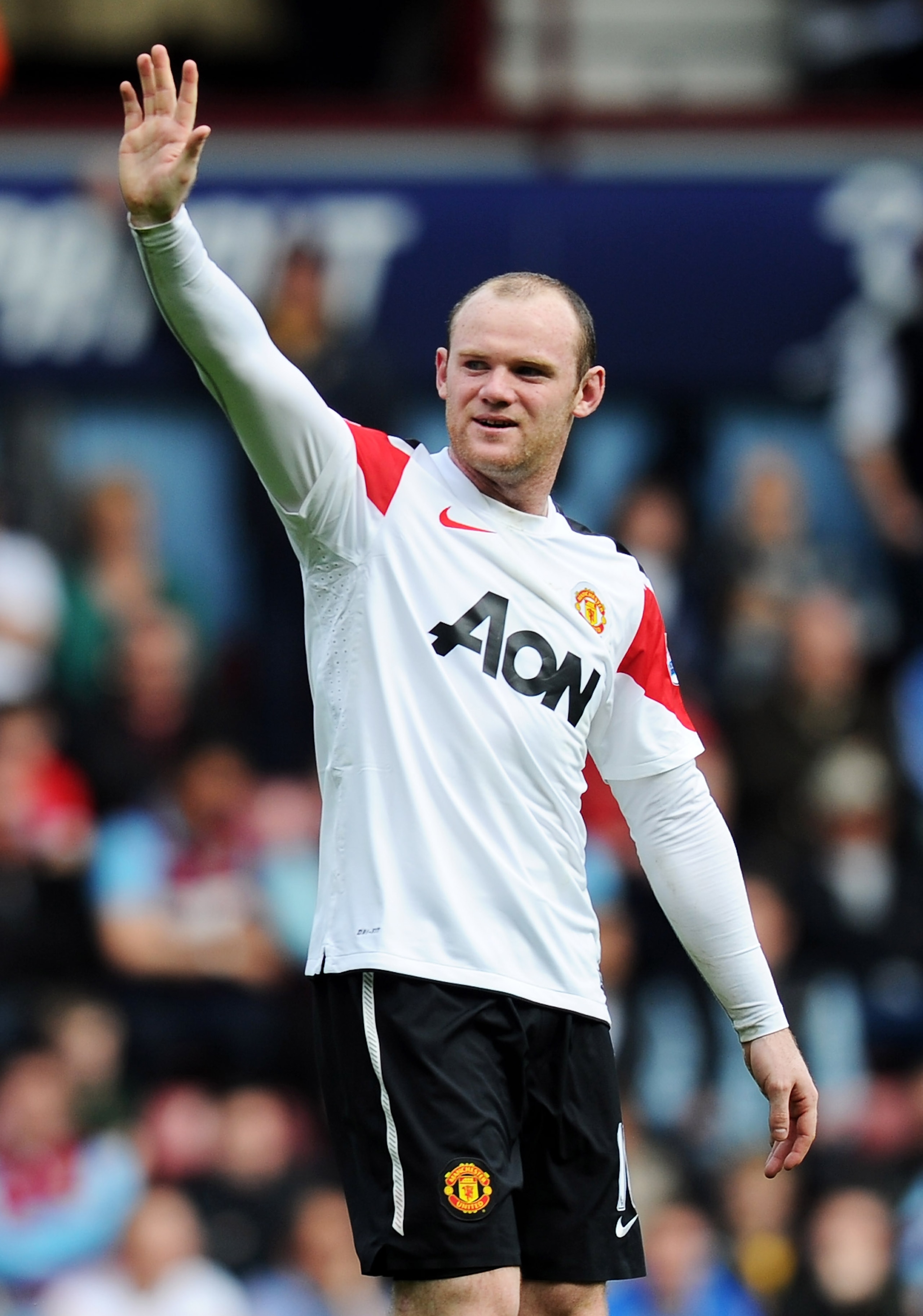 LONDON, ENGLAND - APRIL 02: Wayne Rooney of Manchester United celebrates his hat trick during the Barclays Premier League match between West Ham United and Manchester United at the Boleyn Ground on April 2, 2011 in London, England. (Photo by Mike Hewitt LONDON, ENGLAND - APRIL 02: Wayne Rooney of Manchester United celebrates his hat trick during the Barclays Premier League match between West Ham United and Manchester United at the Boleyn Ground on April 2, 2011 in London, England. (Photo by Mike Hewitt