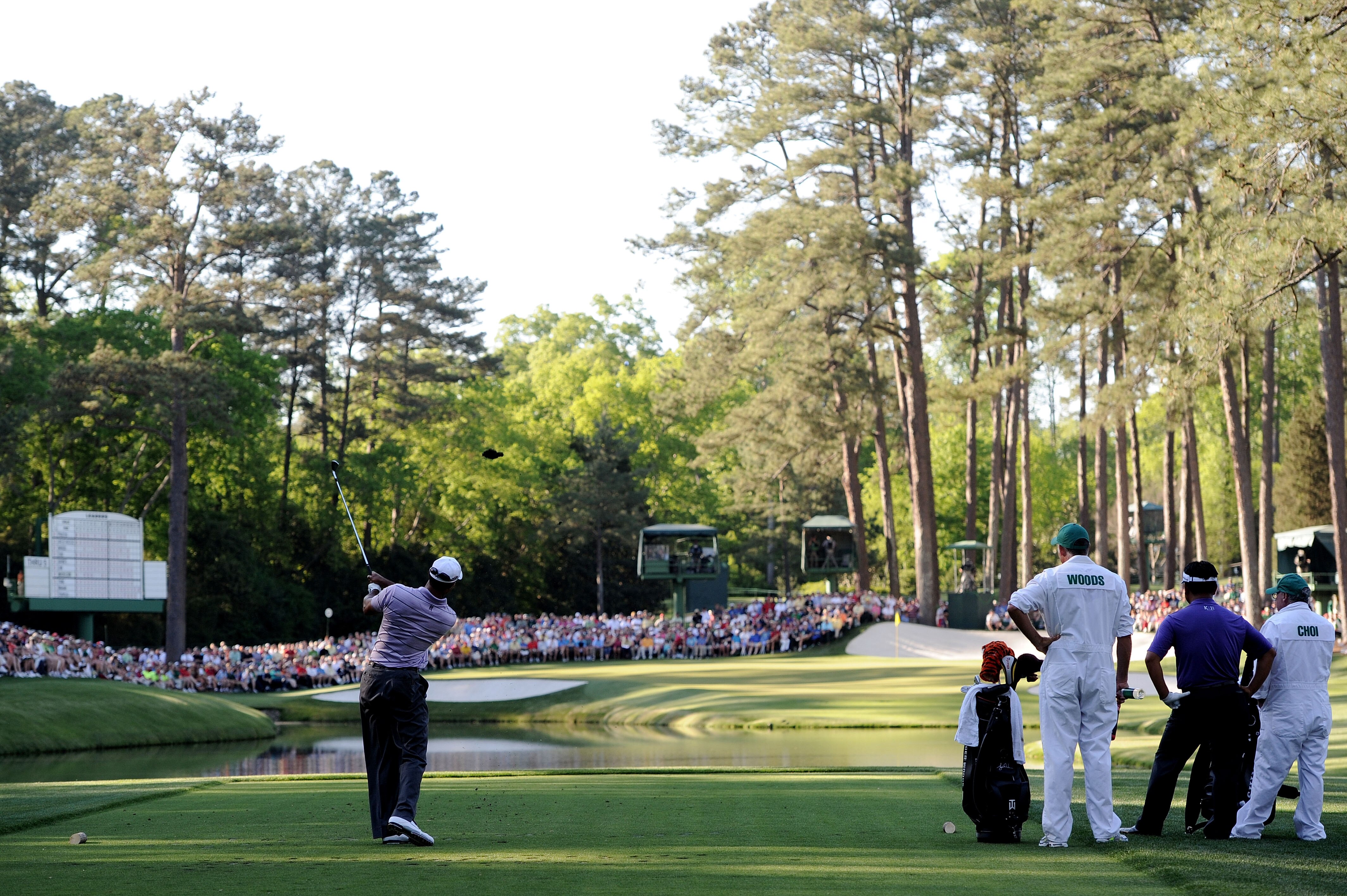 AUGUSTA, GA - APRIL 10:  Tiger Woods hits his tee shot on the 16th hole during the third round of the 2010 Masters Tournament at Augusta National Golf Club on April 10, 2010 in Augusta, Georgia.  (Photo by Harry How/Getty Images)