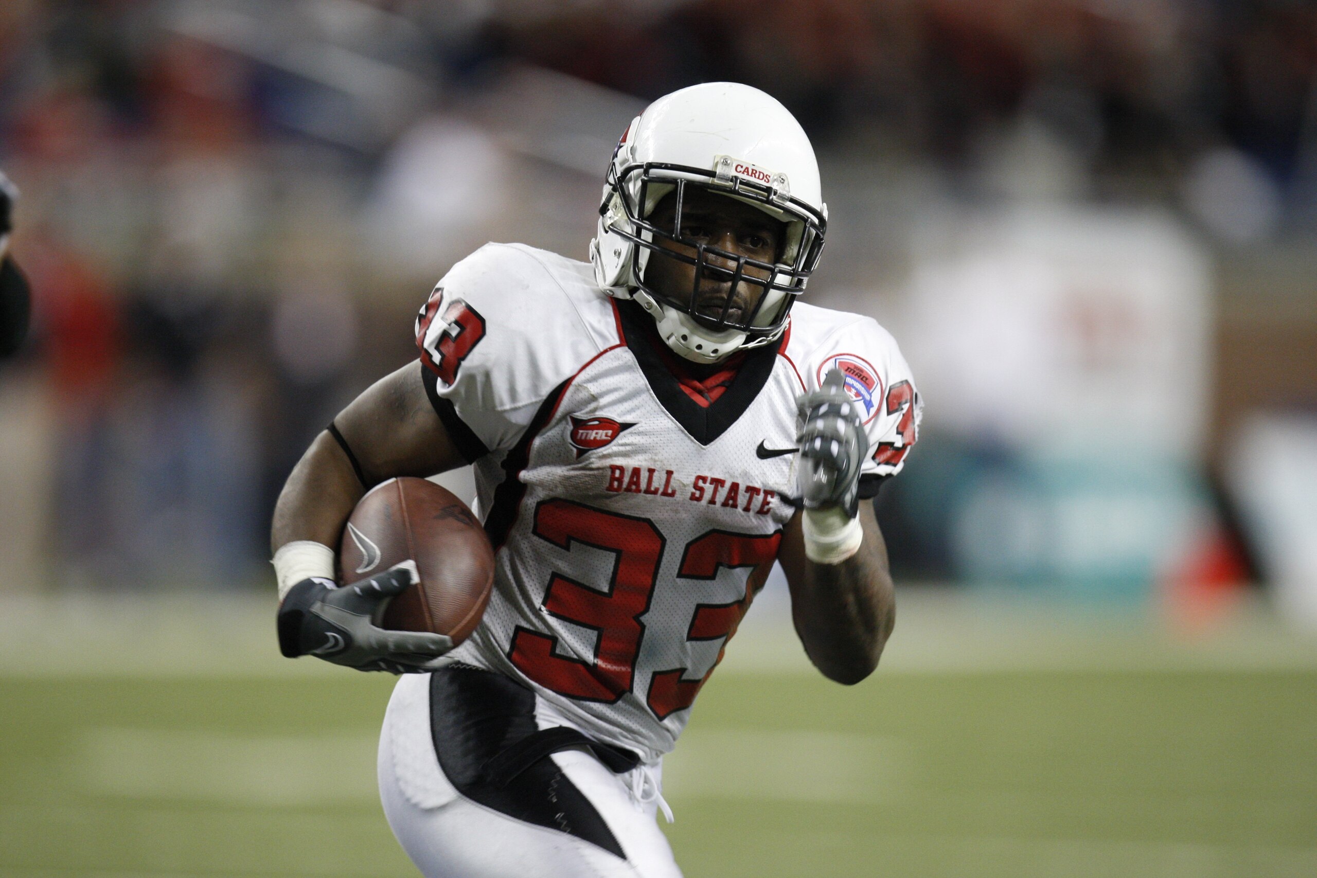 DETROIT - DECEMBER 5: MiQuale Lewis #33 of the Ball State Cardinals runs the ball against the Buffalo Bulls during the MAC Championship game on December 5, 2008 at Ford Field in Detroit Michigan. (Photo by: Gregory Shamus/Getty Images) DETROIT - DECEMBER 5: MiQuale Lewis #33 of the Ball State Cardinals runs the ball against the Buffalo Bulls during the MAC Championship game on December 5, 2008 at Ford Field in Detroit Michigan. (Photo by: Gregory Shamus/Getty Images)