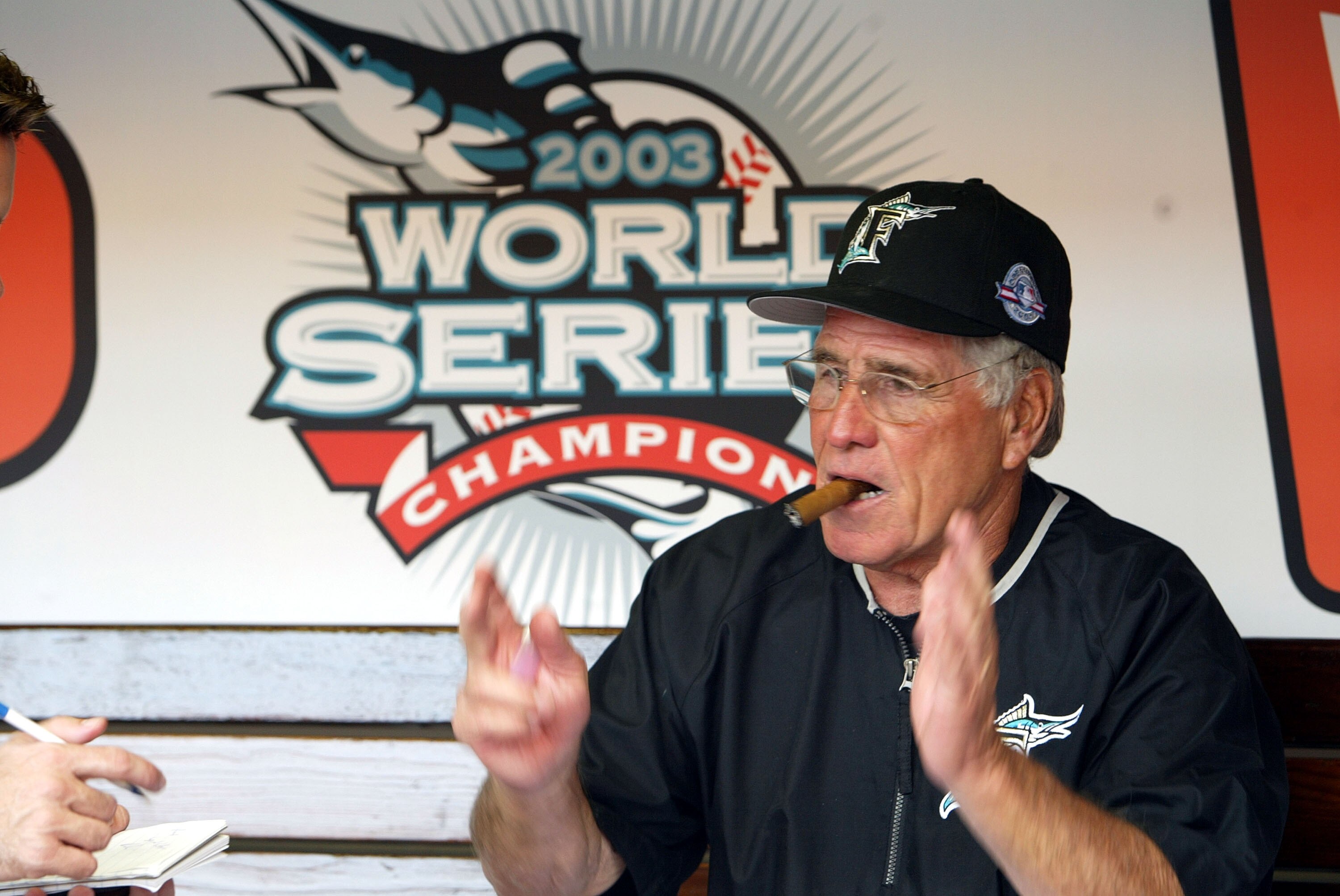 MIAMI - APRIL 10:  Manager of the Florida Marlins Jack McKeon celebrates his World Series ring during the game against the Philadelphia Phillies on April 10, 2004 at Pro Player Stadium in Miami, Florida.  (Photo by Victor Baldizon/Getty Images)