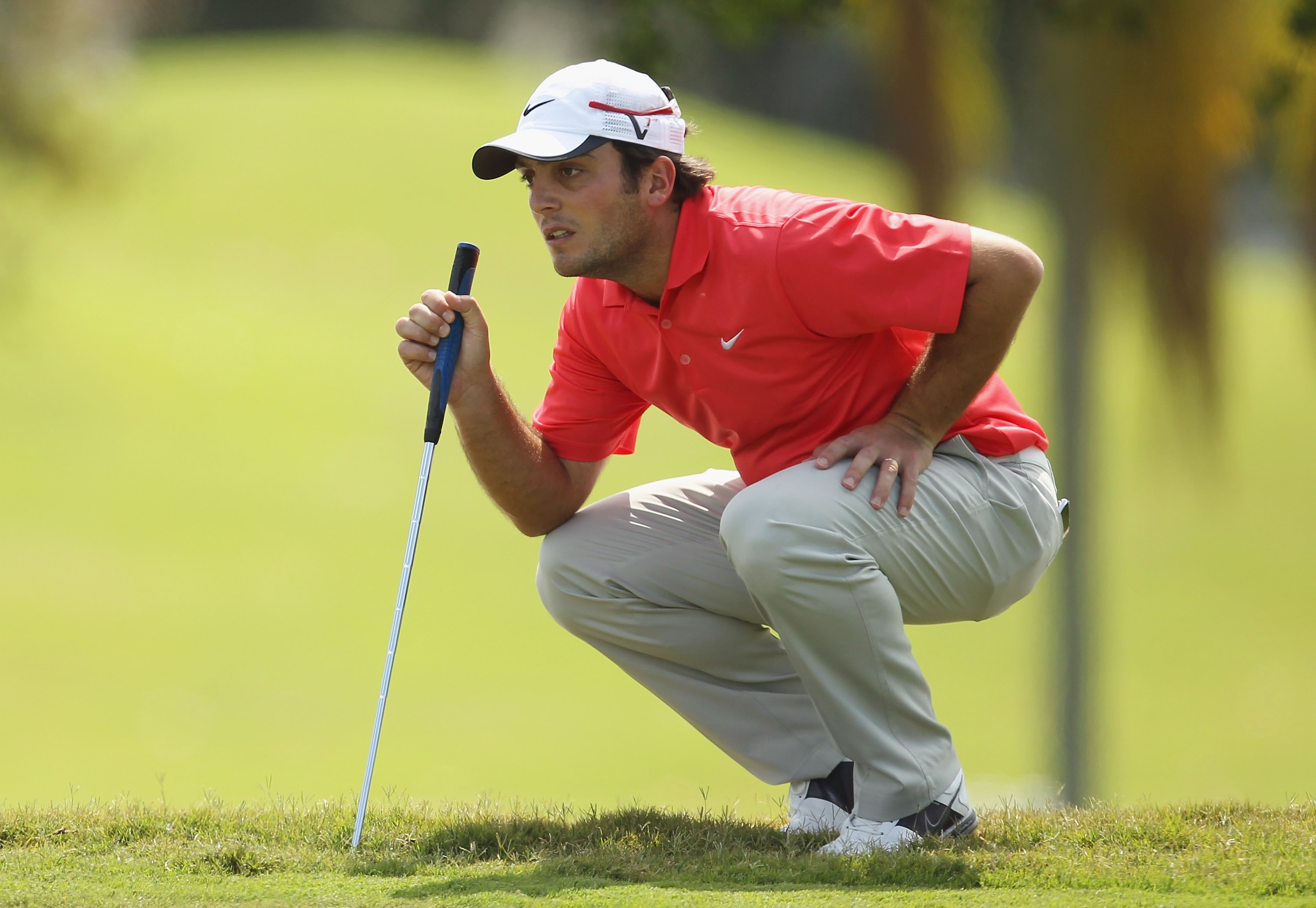DORAL, FL - MARCH 12: Francesco Molinari of Italy lines up a putt on the first hole during the third round of the 2011 WGC- Cadillac Championship at the TPC Blue Monster at the Doral Golf Resort and Spa on March 12, 2011 in Doral, Florida. (Photo by Mik DORAL, FL - MARCH 12: Francesco Molinari of Italy lines up a putt on the first hole during the third round of the 2011 WGC- Cadillac Championship at the TPC Blue Monster at the Doral Golf Resort and Spa on March 12, 2011 in Doral, Florida. (Photo by Mik