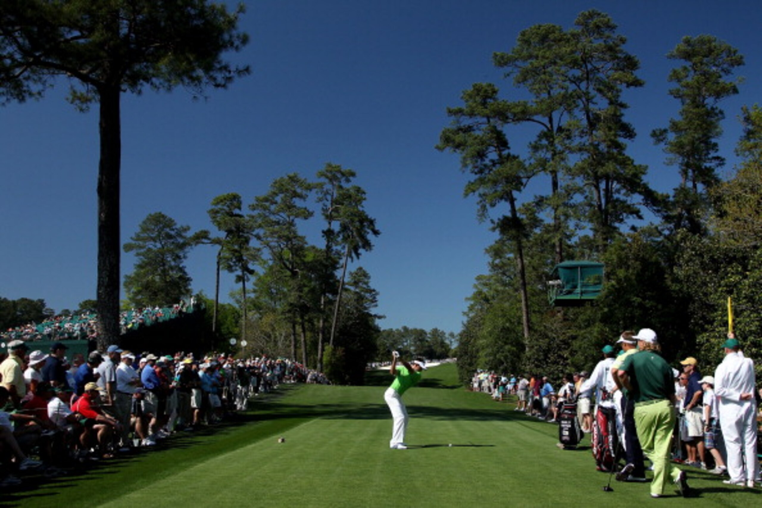 AUGUSTA, GA - APRIL 07: (EDITORS NOTE: A POLARIZING FILTER WAS USED) Charl Schwartzel of South Africa hits his tee shot on the 18th green during the first round of the 2011 Masters Tournament at Augusta National Golf Club on April 7, 2011 in Augusta, Geo AUGUSTA, GA - APRIL 07: (EDITORS NOTE: A POLARIZING FILTER WAS USED) Charl Schwartzel of South Africa hits his tee shot on the 18th green during the first round of the 2011 Masters Tournament at Augusta National Golf Club on April 7, 2011 in Augusta, Geo