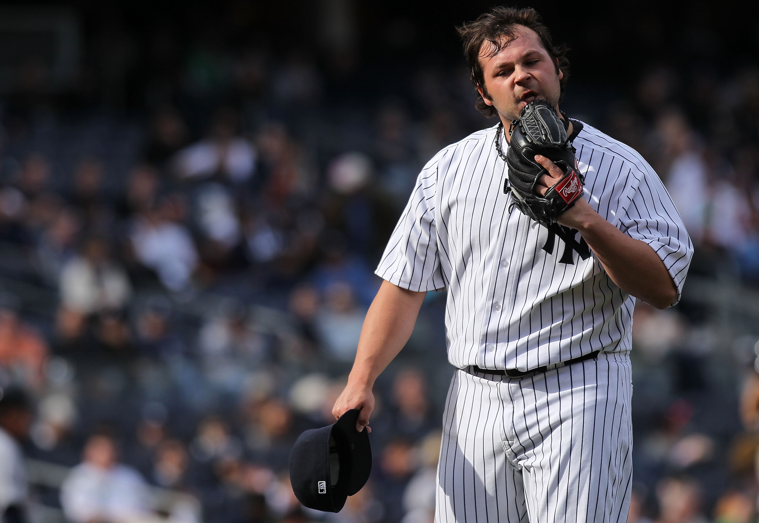 NEW YORK, NY - APRIL 03: Joba Chamberlain #62 of the New York Yankees reacts walking back to the dugout in the ninth inning against the Detroit Tigers at Yankee Stadium on April 3, 2011 in the Bronx borough of New York City. (Photo by Nick Laham/Getty I NEW YORK, NY - APRIL 03: Joba Chamberlain #62 of the New York Yankees reacts walking back to the dugout in the ninth inning against the Detroit Tigers at Yankee Stadium on April 3, 2011 in the Bronx borough of New York City. (Photo by Nick Laham/Getty I
