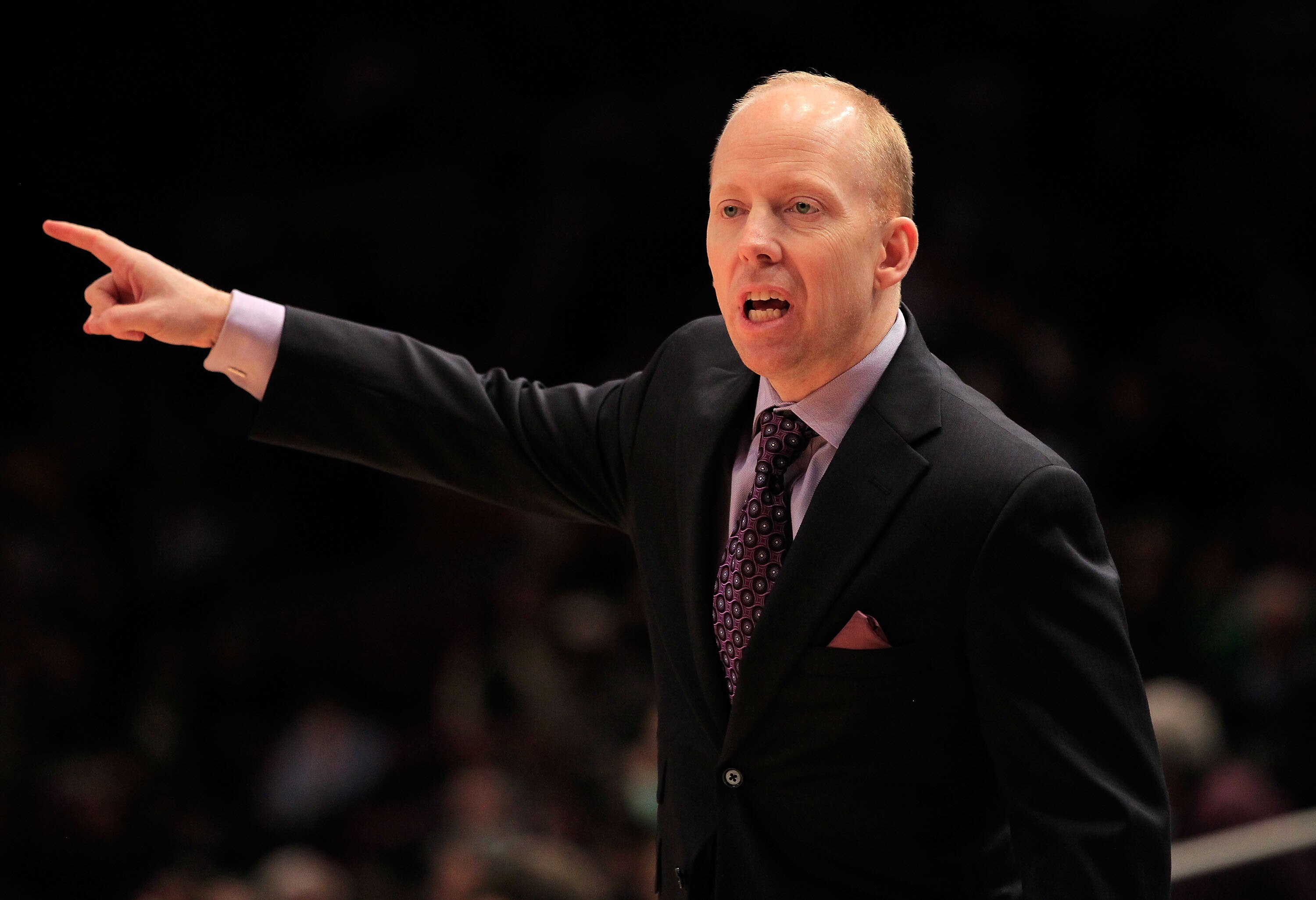 NEW YORK, NY - MARCH 10:  Head coach Mick Cronin of the Cincinnati Bearcats looks on from the bench against the Notre Dame Fighting Irish during the quarterfinals of the 2011 Big East Men's Basketball Tournament presented by American Eagle Outfitters  at
