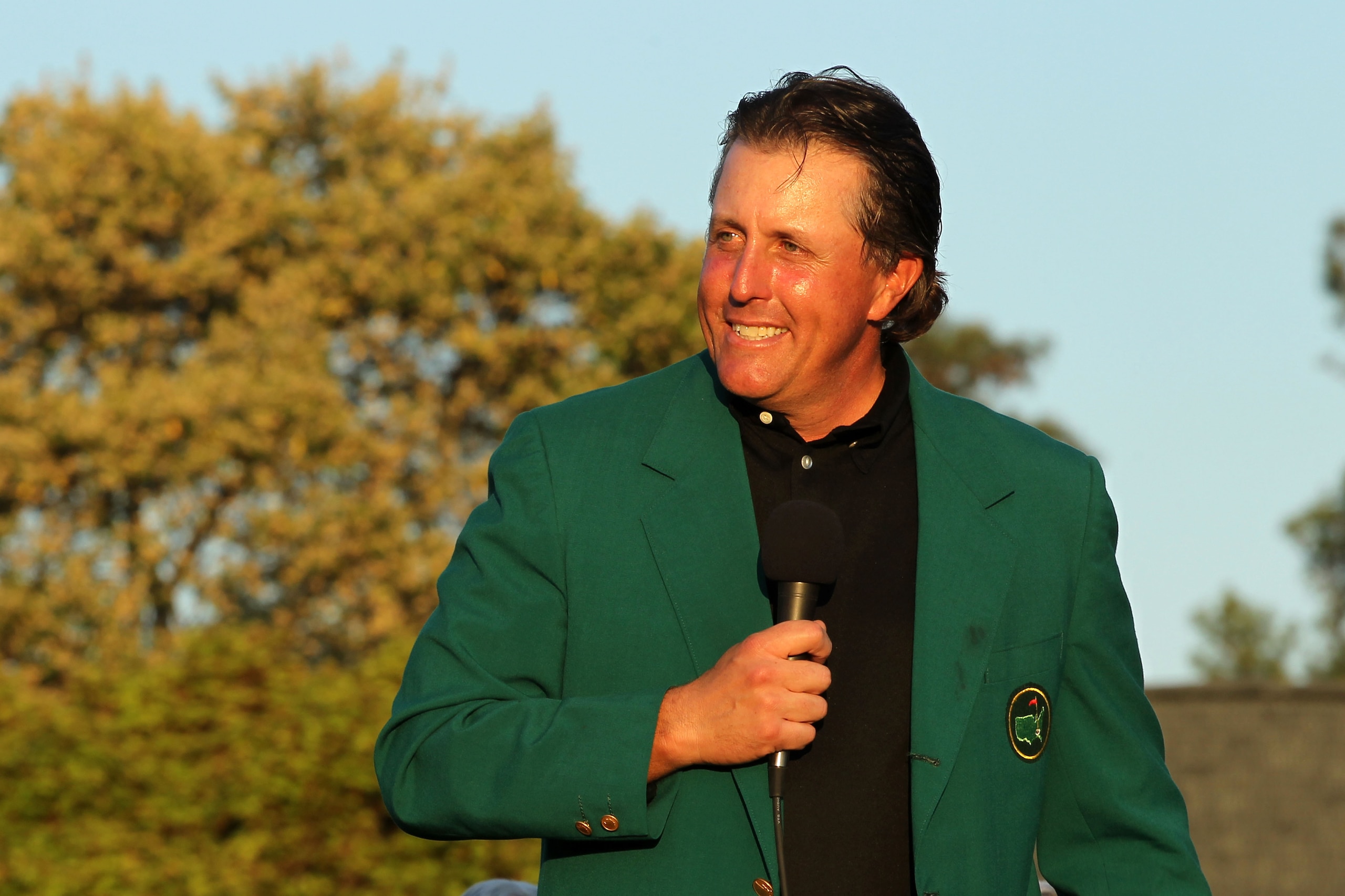 AUGUSTA, GA - APRIL 11:  Phil Mickelson speaks to the gallery during the green jacket presentation after the final round of the 2010 Masters Tournament at Augusta National Golf Club on April 11, 2010 in Augusta, Georgia.  (Photo by Jamie Squire/Getty Imag