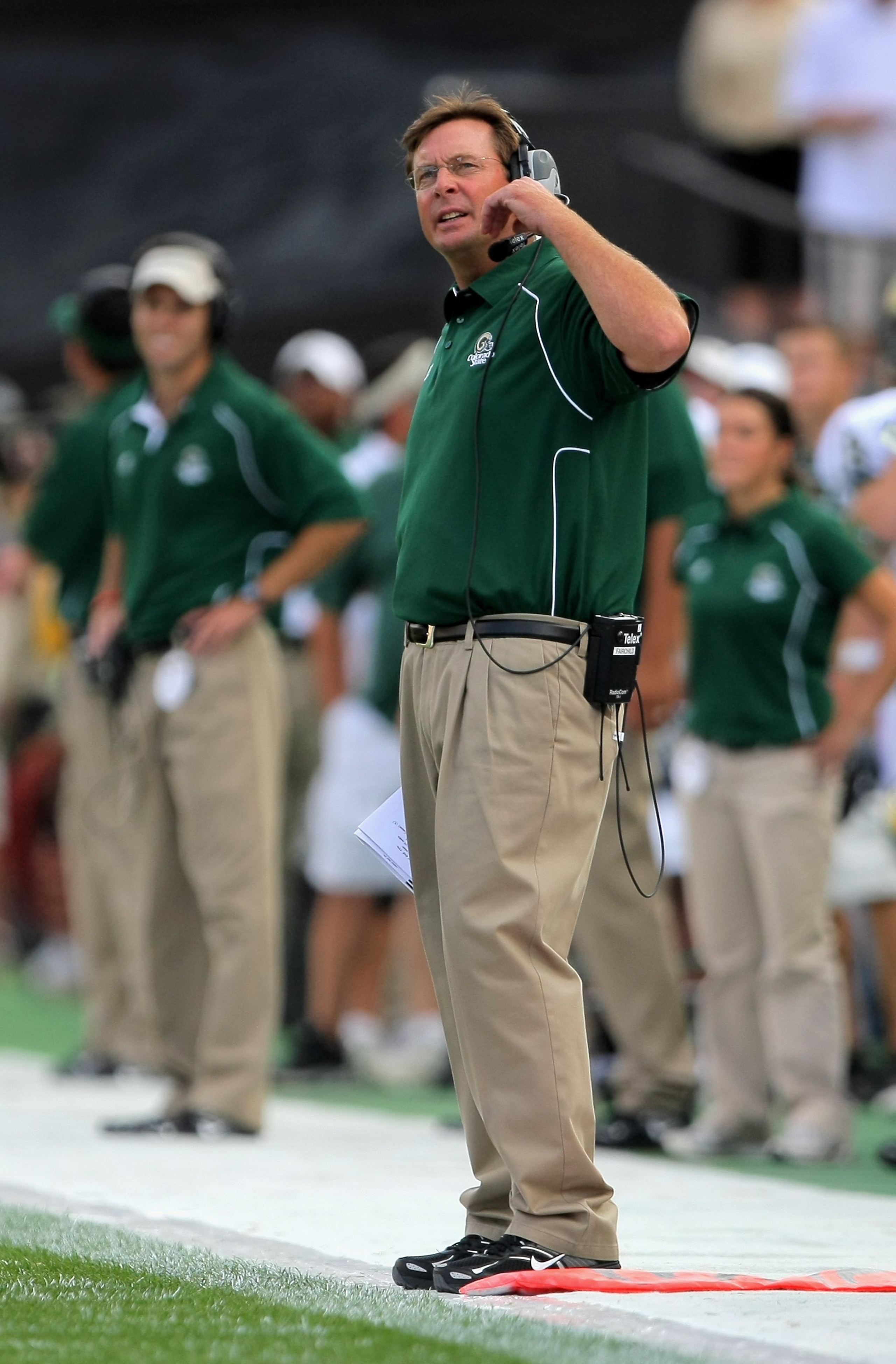 BOULDER, CO - SEPTEMBER 06: Head coach Steve Fairchild of the Colorado State Rams leads his team against the Colorado Buffaloes at Folsom Field on September 6, 2009 in Boulder, Colorado. The Rams defeated the Buffaloes 23-17. (Photo by Doug Pensinger/Ge BOULDER, CO - SEPTEMBER 06: Head coach Steve Fairchild of the Colorado State Rams leads his team against the Colorado Buffaloes at Folsom Field on September 6, 2009 in Boulder, Colorado. The Rams defeated the Buffaloes 23-17. (Photo by Doug Pensinger/Ge