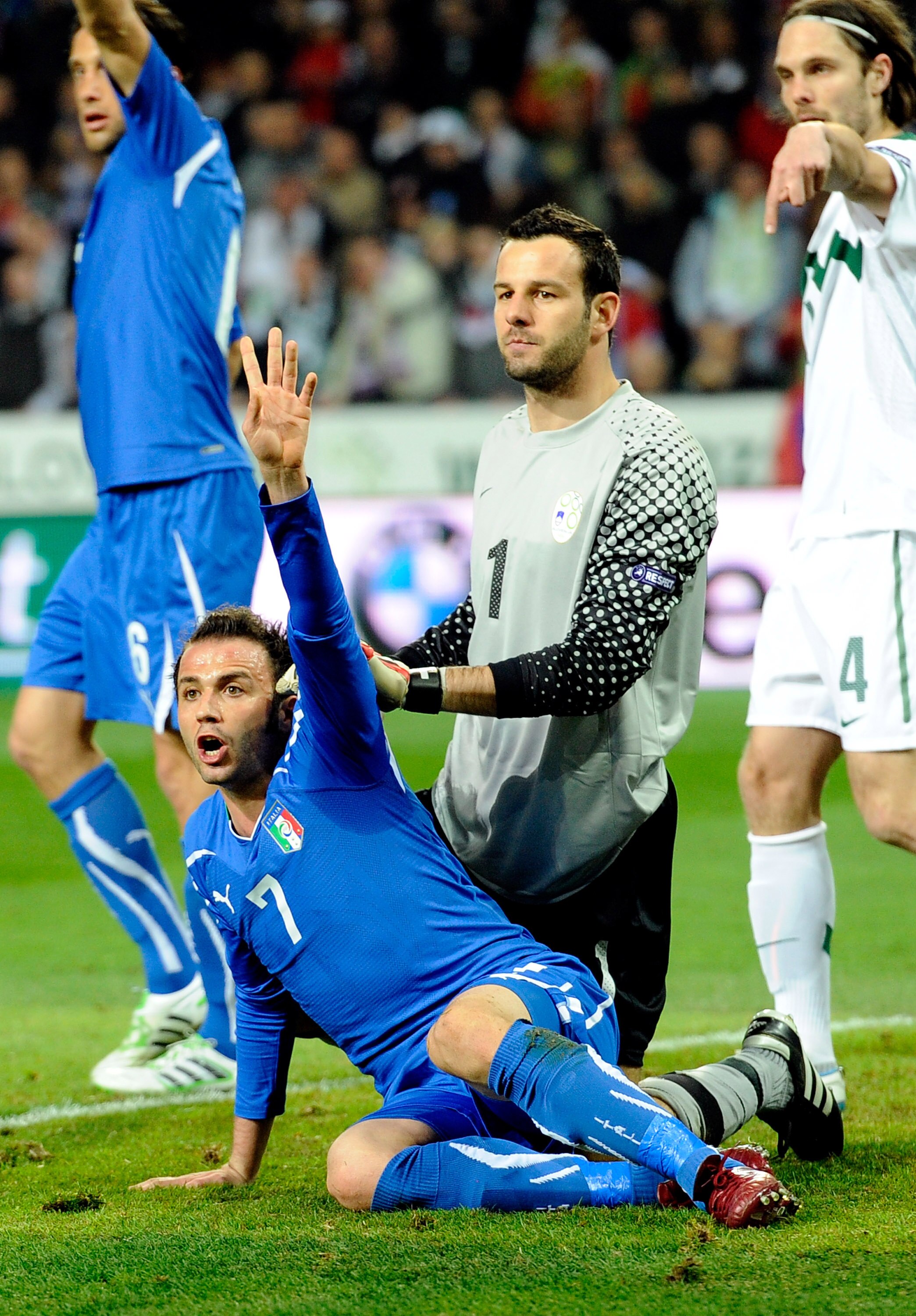 LJUBLJANA, SLOVENIA - MARCH 25:  Giampaolo Pazzini of Italy and Samir Handanovic of Slovenia compete for the ball during the UEFA EURO 2012 qualifier between Slovenia and Italy on March 25, 2011 in Ljubljana, Slovenia.  (Photo by Claudio Villa/Getty Image