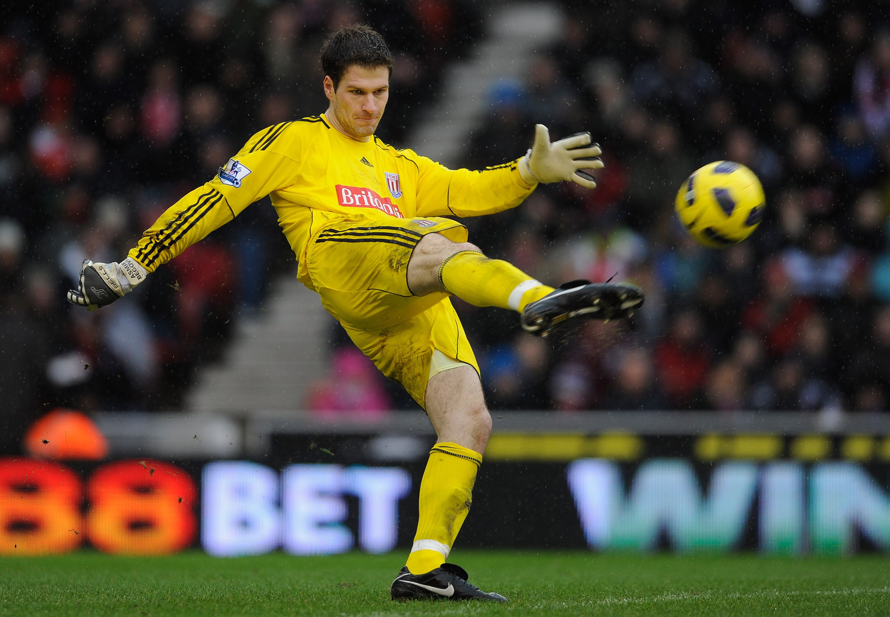 STOKE ON TRENT, ENGLAND - FEBRUARY 05: Asmir Begovic of Stoke takes a drop kick during the Barclays Premier League match between Stoke City and Sunderland at the Britannia Stadium on February 5, 2011 in Stoke on Trent, England.  (Photo by Michael Regan/Ge