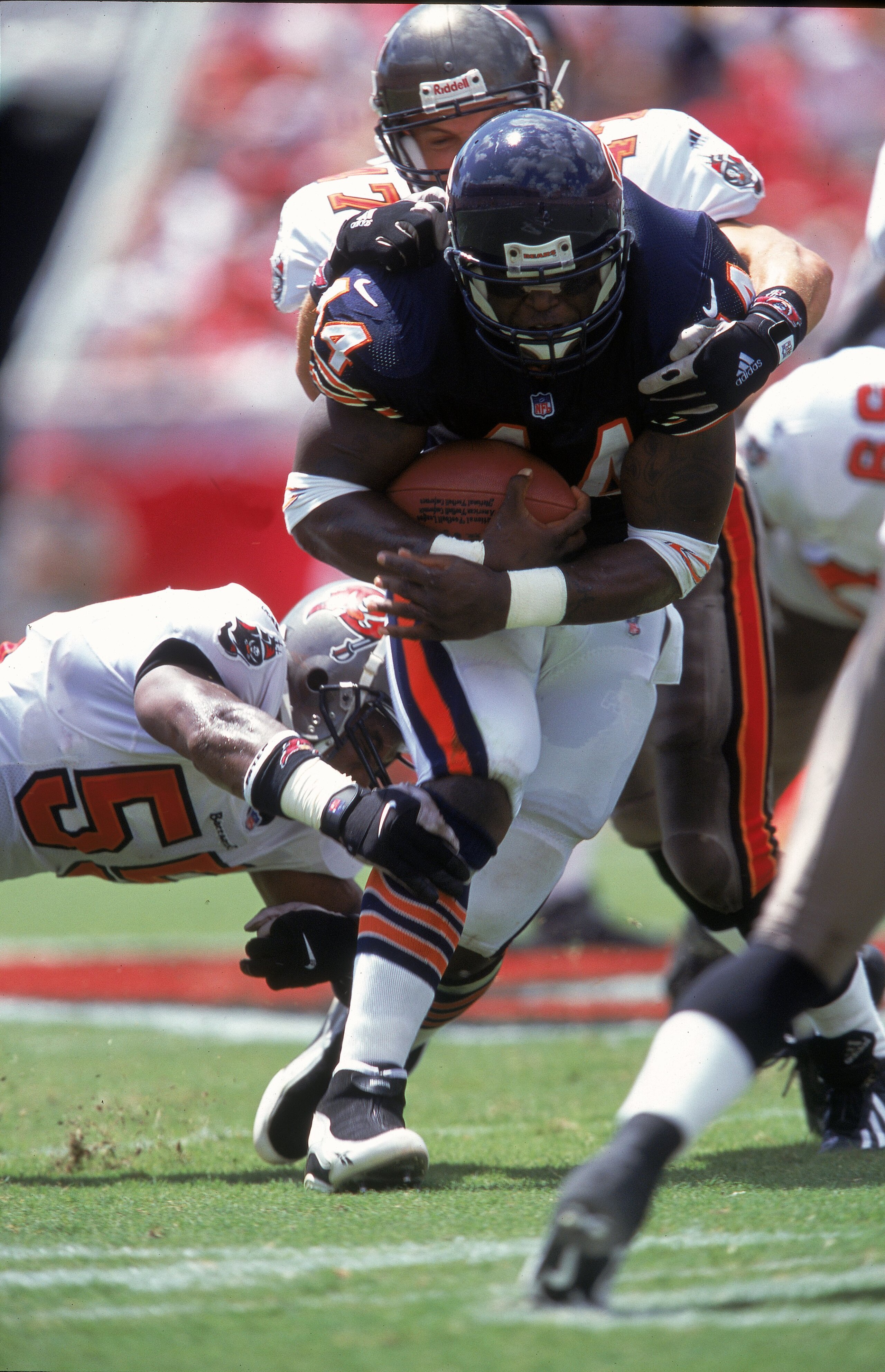10 Sep 2000:  Curtis Enis #44 of the Chicago Bears gets tackled during the game against the Tampa Bay Buccaneers at the Raymond James Stadium in Tampa Bay, Florida. The Buccaneers defeated the Bears 40-0.Mandatory Credit: Andy Lyons  /Allsport