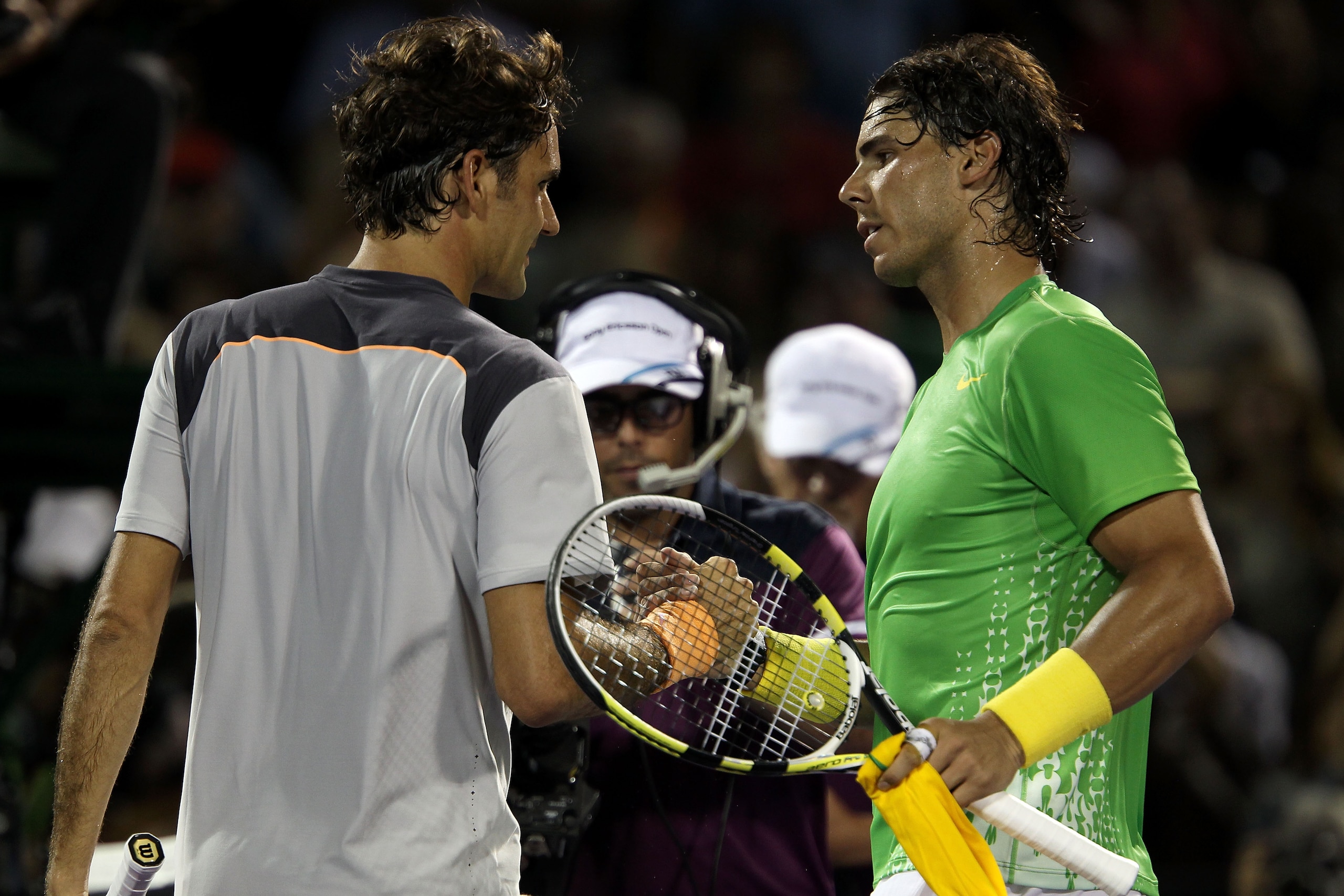 KEY BISCAYNE, FL - APRIL 01:  Rafael Nadal (R) of Spain is congratulated by Roger Federer of Switzerland after Nadal won their men's semifinal singles match at the Sony Ericsson Open at Crandon Park Tennis Center on April 1, 2011 in Key Biscayne, Florida.