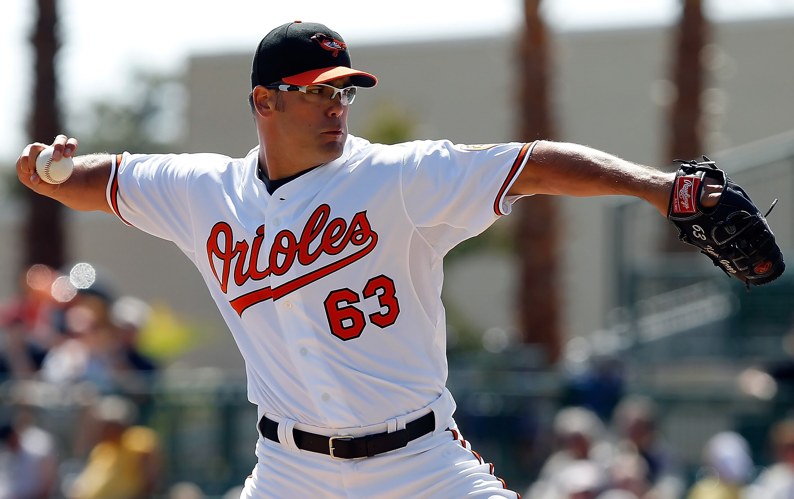 SARASOTA, FL - MARCH 03:  Pitcher Kevin Gregg #63 of the Baltimore Orioles pitches against the Minnesota Twins during a Grapefruit League Spring Training Game at Ed Smith Stadium on March 3, 2011 in Sarasota, Florida.  (Photo by J. Meric/Getty Images)