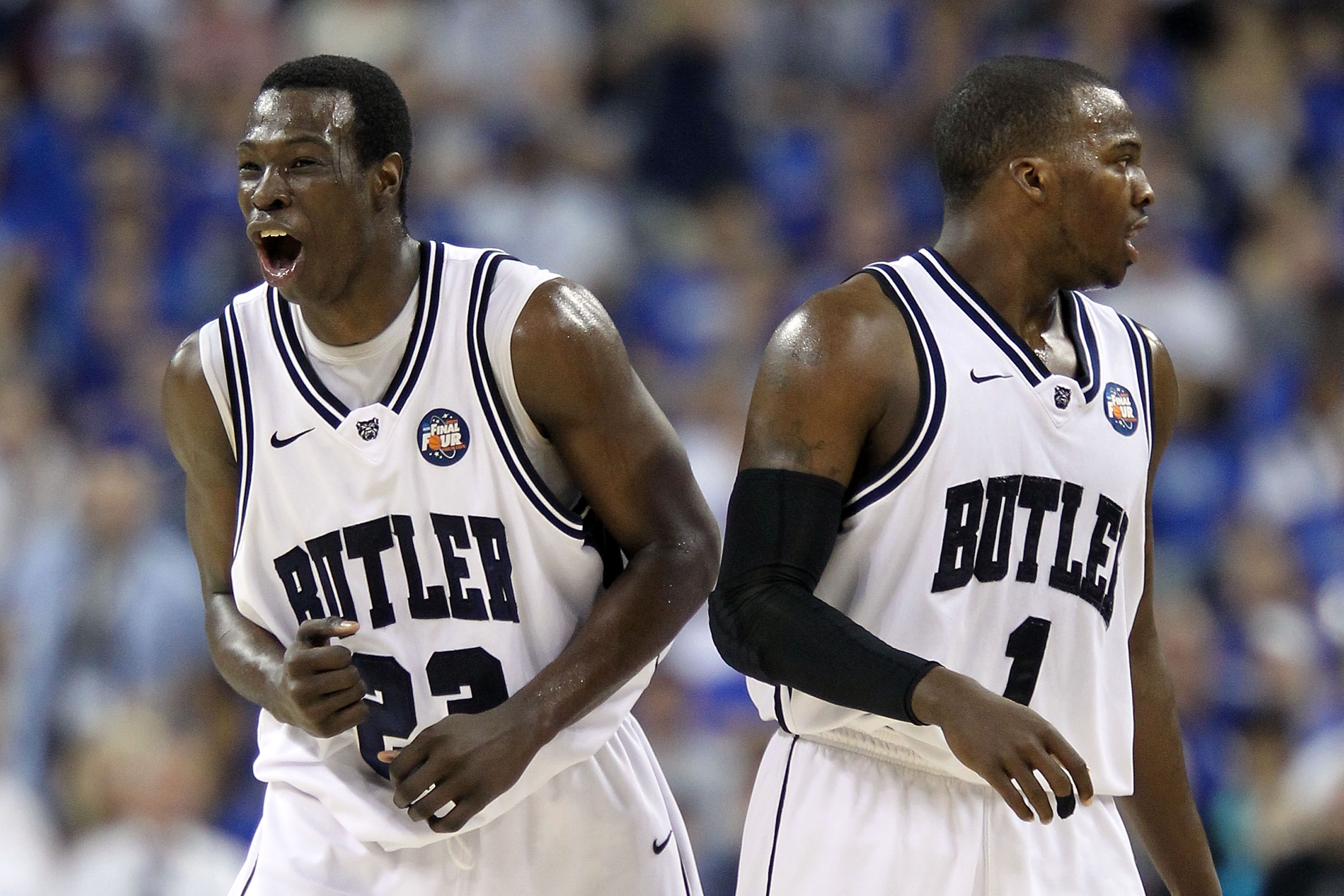 HOUSTON, TX - APRIL 02:  Khyle Marshall #23 of the Butler Bulldogs reacts alongside teammate Shelvin Mack #1 in the first half while taking on Virginia Commonwealth Rams during the National Semifinal game of the 2011 NCAA Division I Men's Basketball Champ