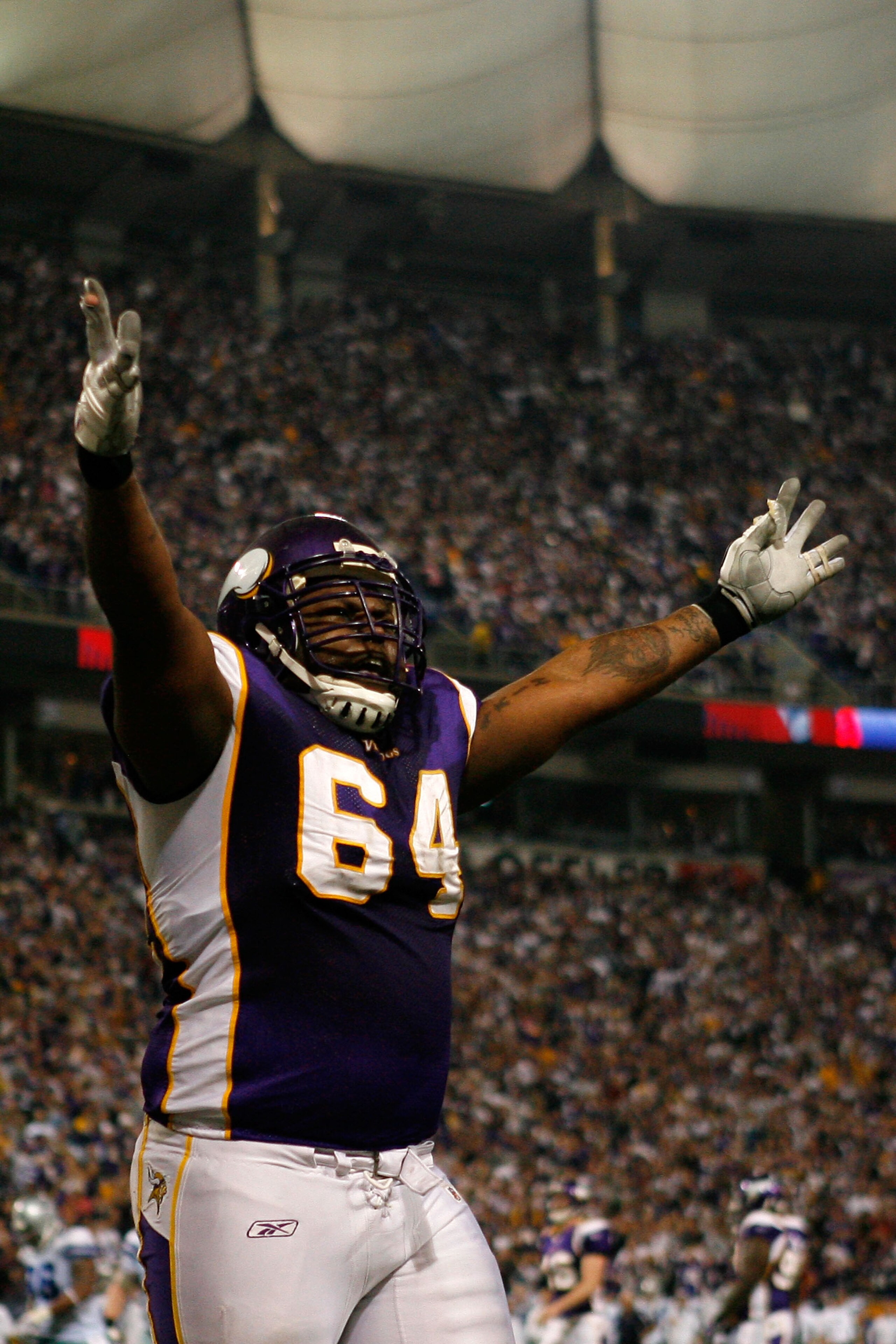 MINNEAPOLIS - JANUARY 17: Anthony Herrera #64 of the Minnesota Vikings celebrate Sidney Rice's 45 yard touchdown against the Dallas Cowboys during the fourth quarter of the NFC Divisional Playoff Game at Hubert H. Humphrey Metrodome on January 17, 2010 in