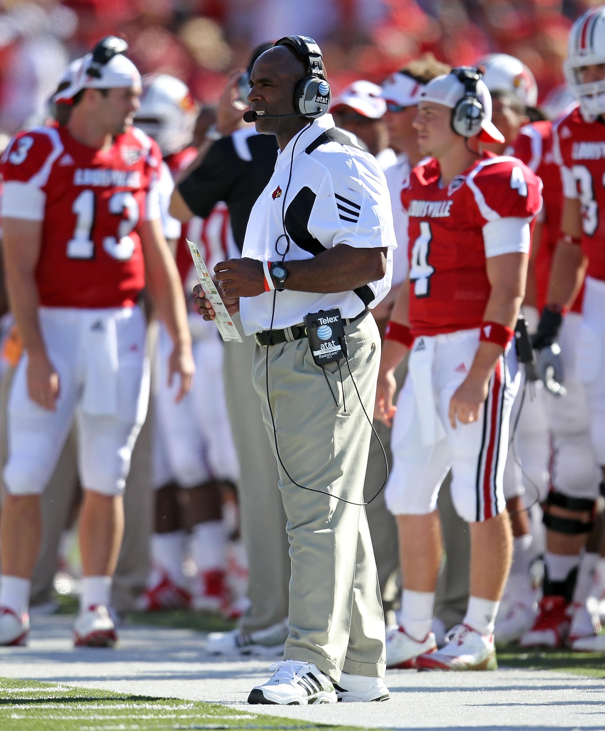 LOUISVILLE, KY - SEPTEMBER 04: Charlie Strong the Head Coach of the Louisville Cardinals gives instructions to his team during the game against the Kentucky Wildcats at Papa John's Cardinal Stadium on September 4, 2010 in Louisville, Kentucky. (Photo by LOUISVILLE, KY - SEPTEMBER 04: Charlie Strong the Head Coach of the Louisville Cardinals gives instructions to his team during the game against the Kentucky Wildcats at Papa John's Cardinal Stadium on September 4, 2010 in Louisville, Kentucky. (Photo by