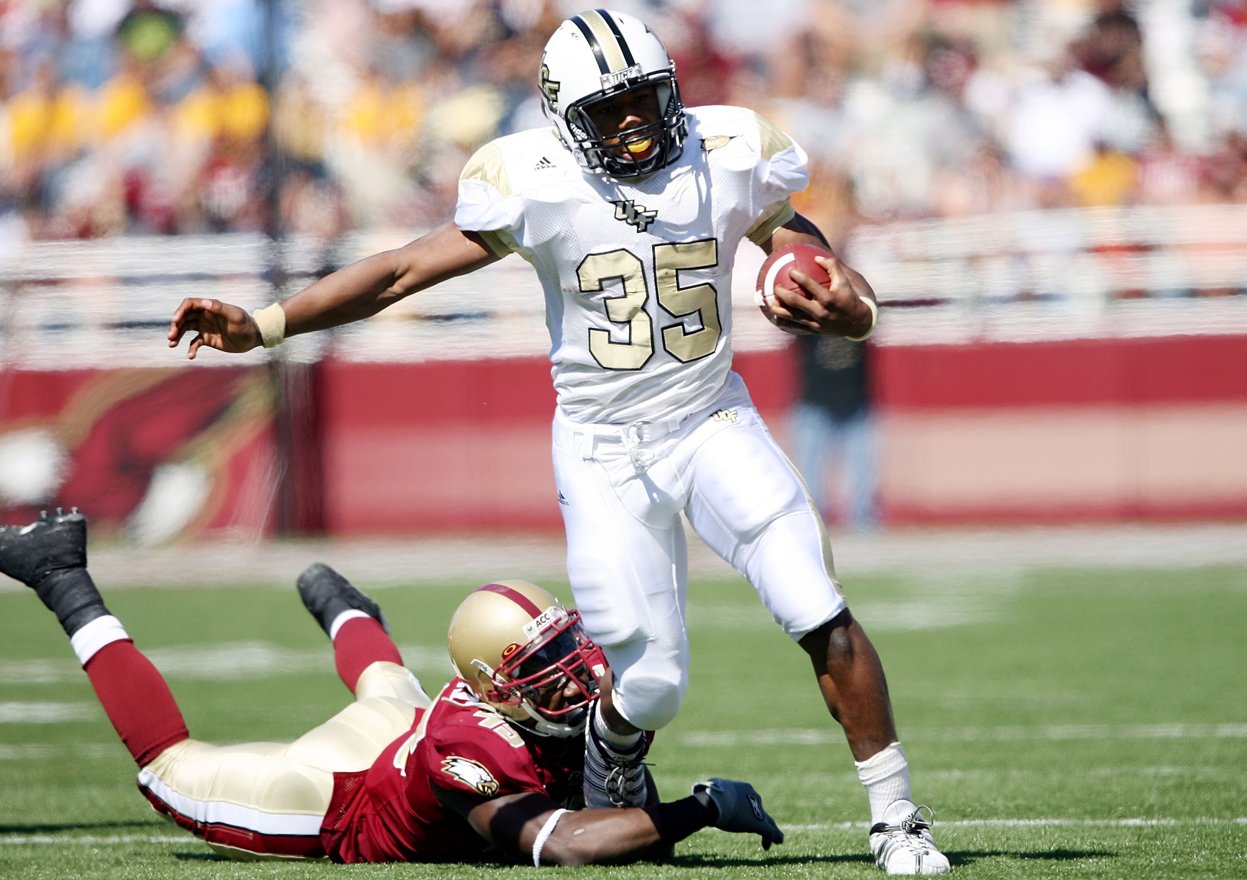 CHESTNUT HILL, MA - SEPTEMBER 20: Ronnie Weaver #35 of the Central Florida Knights carries the ball as Wes Davis #45 of the Boston College Eagles tries to tackle on September 20, 2008 at Alumni Stadium in Chestnut Hill, Massachusetts. (Photo by Elsa/Get CHESTNUT HILL, MA - SEPTEMBER 20: Ronnie Weaver #35 of the Central Florida Knights carries the ball as Wes Davis #45 of the Boston College Eagles tries to tackle on September 20, 2008 at Alumni Stadium in Chestnut Hill, Massachusetts. (Photo by Elsa/Get