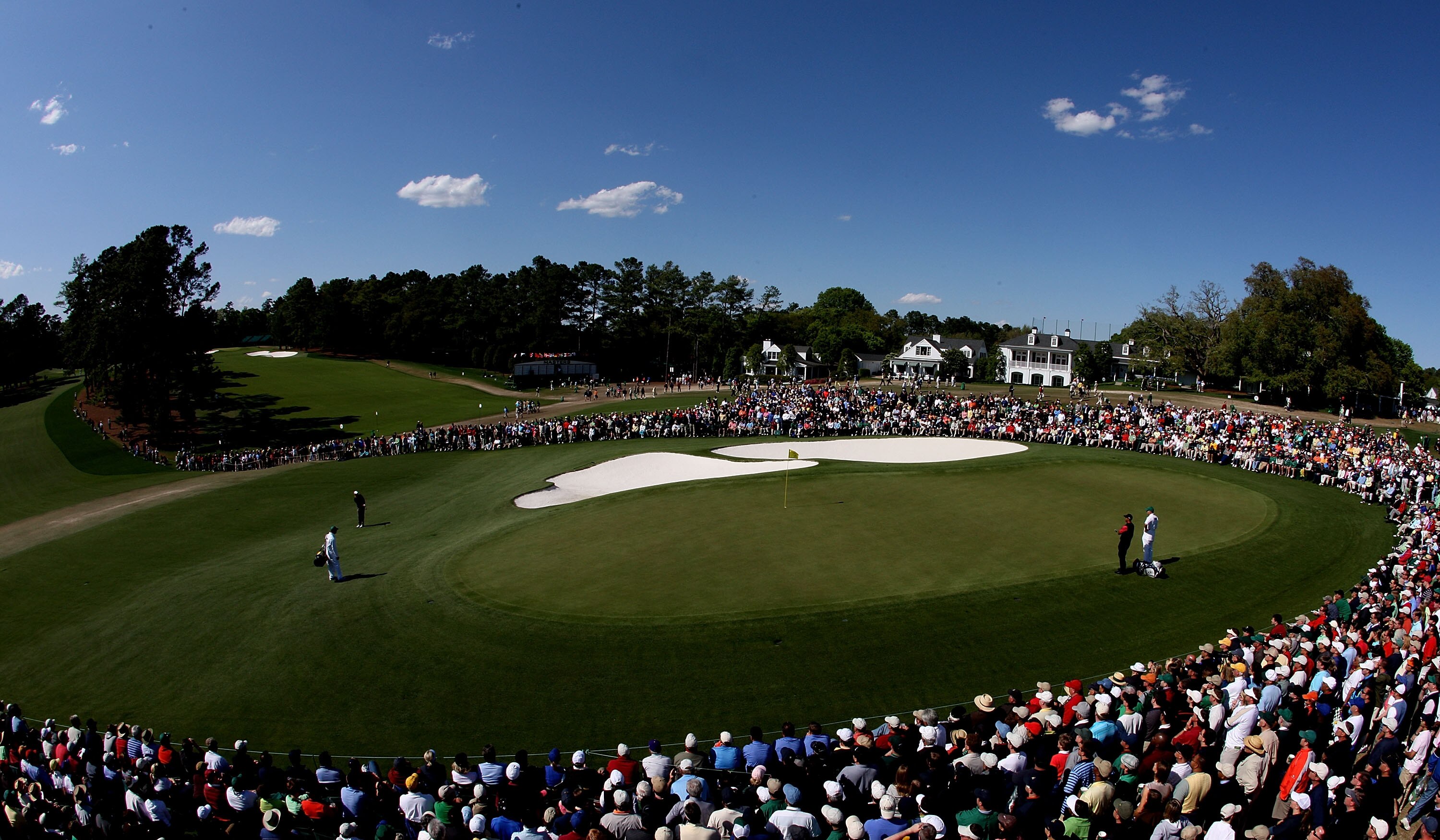 AUGUSTA, GA - APRIL 13:  Stewart Cink and Tiger Woods play the ninth hole during the final round of the 2008 Masters Tournament at Augusta National Golf Club on April 13, 2008 in Augusta, Georgia.  (Photo by David Cannon/Getty Images)