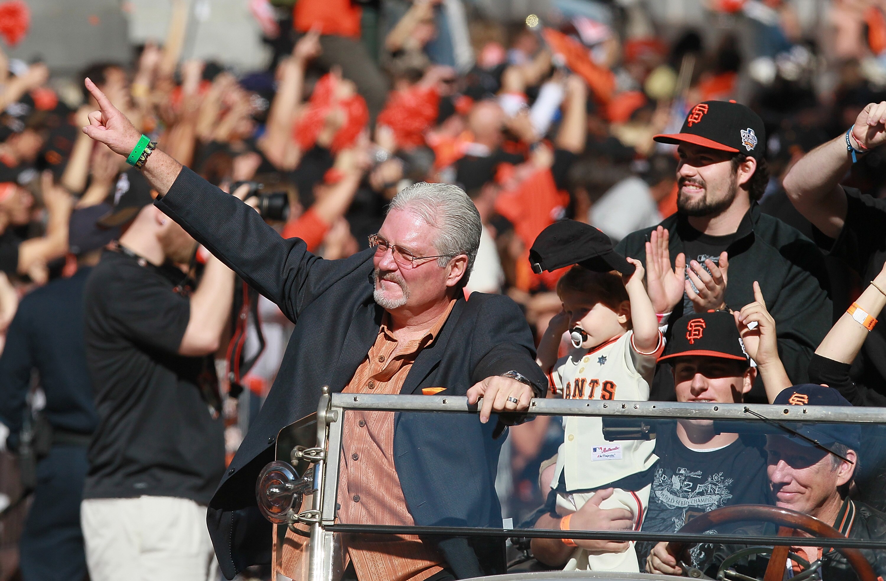 SAN FRANCISCO - NOVEMBER 03:  San Francisco Giants general manager Brian Sabean waves as he celebrates during the Giants' vicotry parade on November 3, 2010 in San Francisco, California. Thousands of Giants fans lined the streets of San Francisco to watch