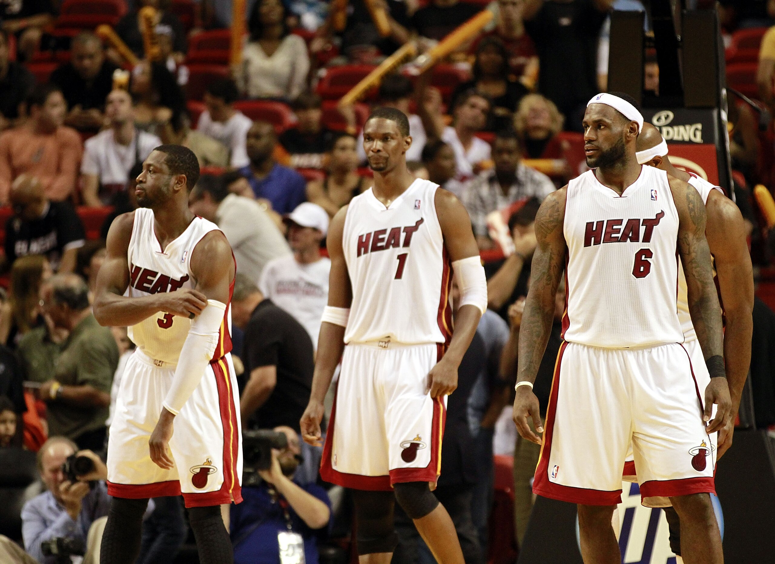 MIAMI, FL - MARCH 25: Forward Chris Bosh #1, Forward LeBron James #6 and Guard Dwyane Wade #3 of the Miami Heat against the Philadelphia 76ers at American Airlines Arena on March 25, 2011 in Miami, Florida. The Heat defeated the Sixers 111-99. NOTE TO US MIAMI, FL - MARCH 25: Forward Chris Bosh #1, Forward LeBron James #6 and Guard Dwyane Wade #3 of the Miami Heat against the Philadelphia 76ers at American Airlines Arena on March 25, 2011 in Miami, Florida. The Heat defeated the Sixers 111-99. NOTE TO US