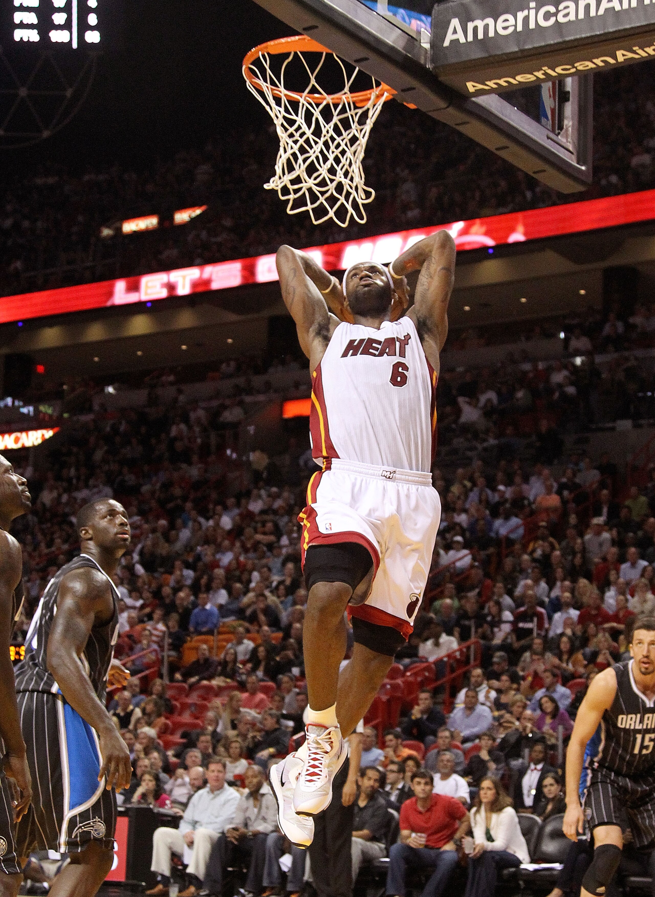 MIAMI, FL - MARCH 03: LeBron James #6 of the Miami Heat dunks the ball during a game against the Orlando Magic at American Airlines Arena on March 3, 2011 in Miami, Florida. NOTE TO USER: User expressly acknowledges and agrees that, by downloading and/or MIAMI, FL - MARCH 03: LeBron James #6 of the Miami Heat dunks the ball during a game against the Orlando Magic at American Airlines Arena on March 3, 2011 in Miami, Florida. NOTE TO USER: User expressly acknowledges and agrees that, by downloading and/or