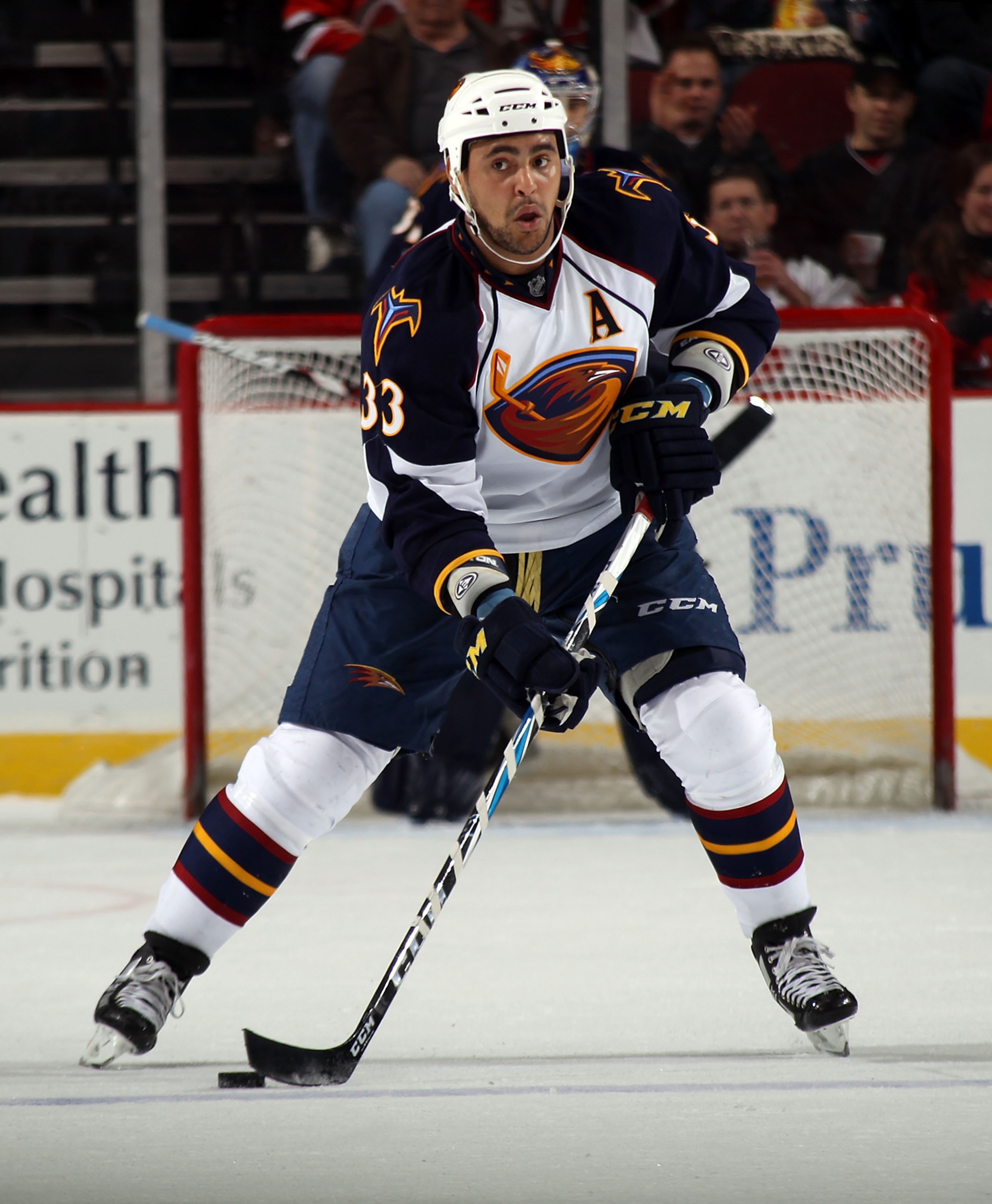 NEWARK, NJ - MARCH 15: Dustin Byfuglien #33 of the Atlanta Thrashers skates against the New Jersey Devils at the Prudential Center on March 15, 2011 in Newark, New Jersey. The Devils defeated the Thrashers 4-2. (Photo by Bruce Bennett/Getty Images) NEWARK, NJ - MARCH 15: Dustin Byfuglien #33 of the Atlanta Thrashers skates against the New Jersey Devils at the Prudential Center on March 15, 2011 in Newark, New Jersey. The Devils defeated the Thrashers 4-2. (Photo by Bruce Bennett/Getty Images)