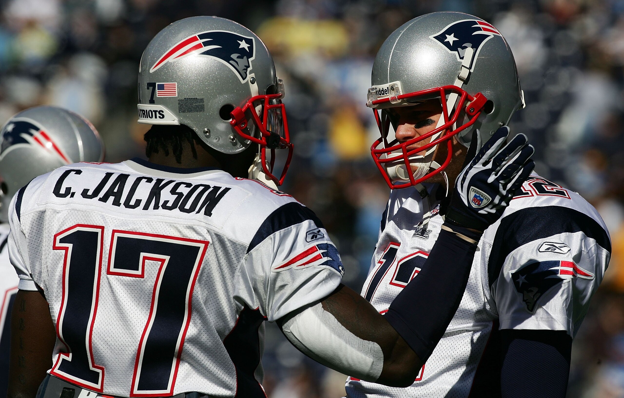SAN DIEGO - JANUARY 14: (R-L) Quarterback Tom Brady #12 of the New England Patriots talks with wide receiver Chad Jackson #17 before the game against the San Diego Chargers during the AFC Divisional Playoffs held on January 14, 2007 at Qualcomm Stadium i SAN DIEGO - JANUARY 14: (R-L) Quarterback Tom Brady #12 of the New England Patriots talks with wide receiver Chad Jackson #17 before the game against the San Diego Chargers during the AFC Divisional Playoffs held on January 14, 2007 at Qualcomm Stadium i