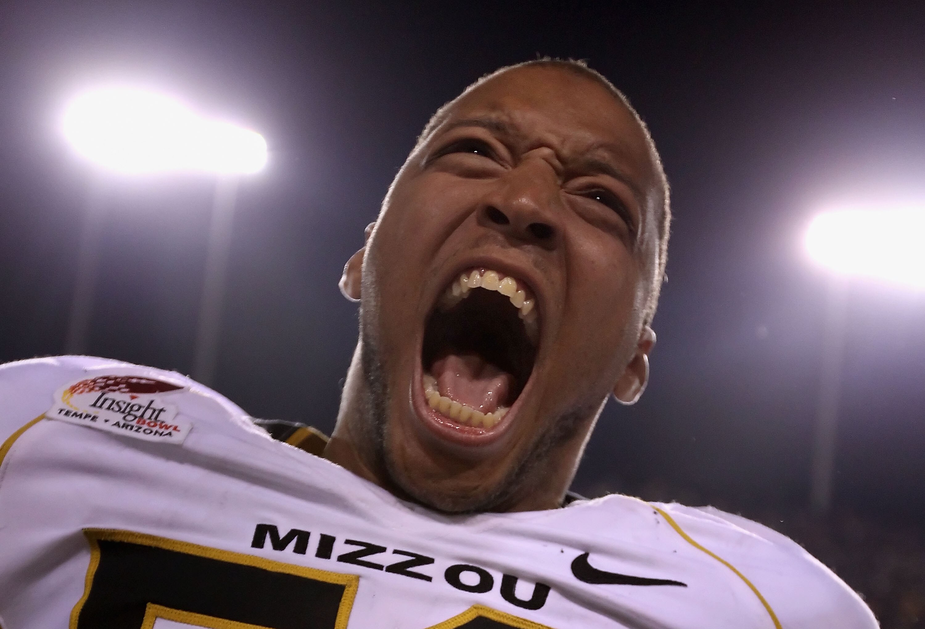 TEMPE, AZ - DECEMBER 28:  Defensive lineman Michael Sam #52 of the Missouri Tigers reacts to an interception during the Insight Bowl against the Iowa Hawkeyes at Sun Devil Stadium on December 28, 2010 in Tempe, Arizona.  The Hawkeyes defeated the Tigers 2