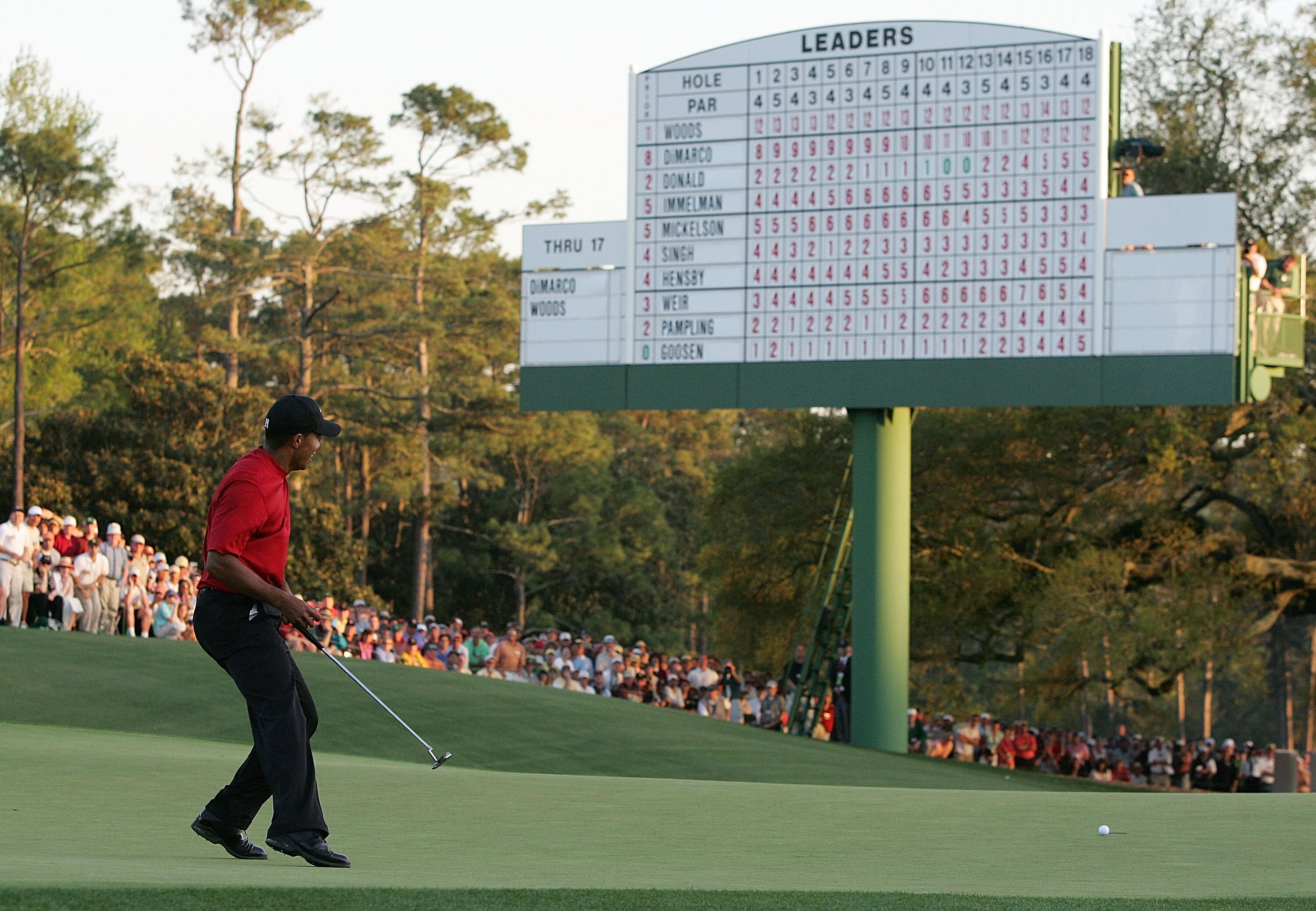 AUGUSTA, GA - APRIL 10:  Tiger Woods watches his birdie putt on the 18th green during his sudden-death playoff with Chris DiMarco at The Masters at the Augusta National Golf Club on April 10, 2005 in Augusta, Georgia.  (Photo by Andrew Redington/Getty Ima