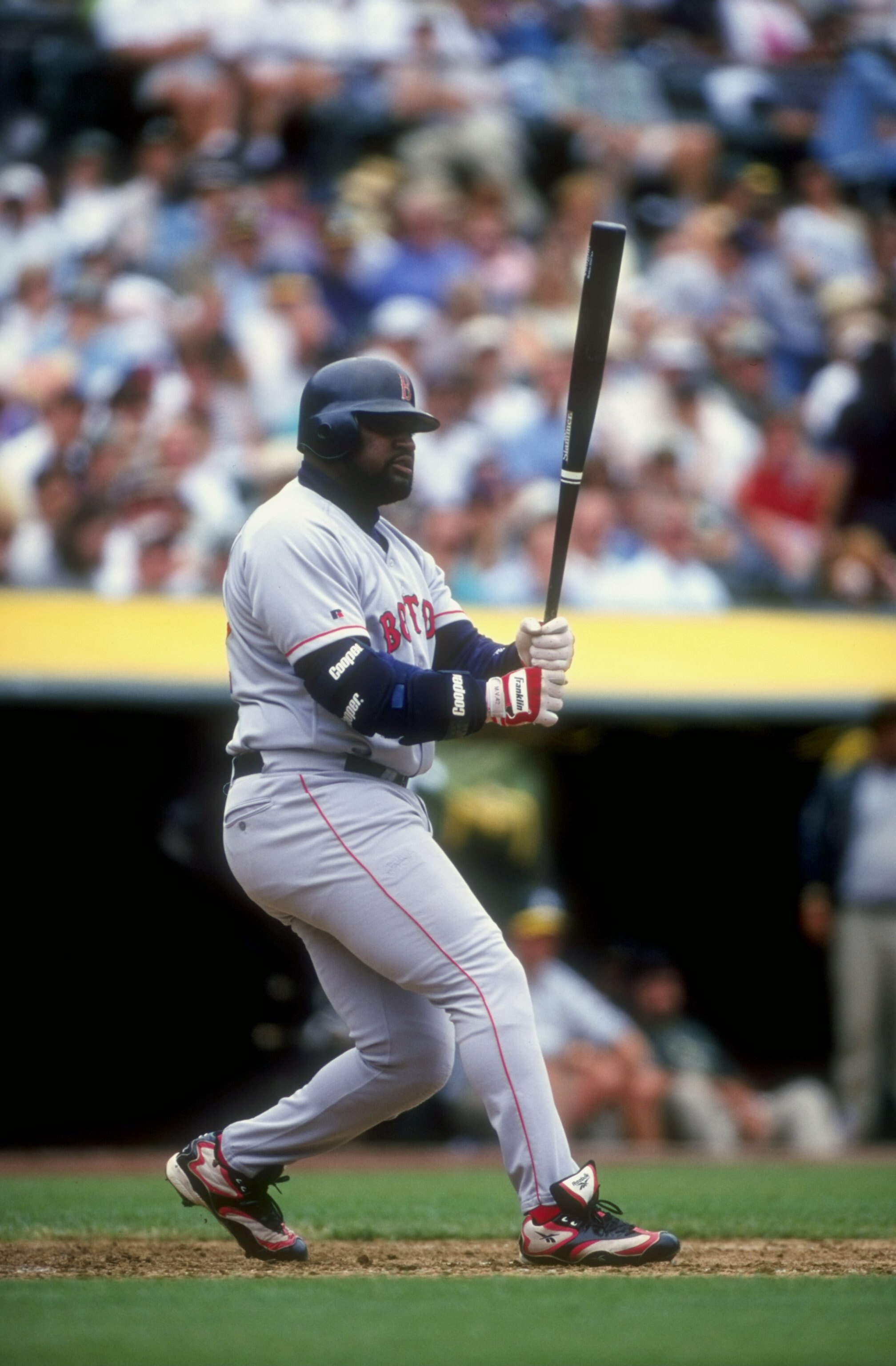 30 Jul 1998:  Infielder Mo Vaughn #42 of the Boston Red Sox in action during a game against the Oakland Athletics at the Oakland Coliseum in Oakland, California. The Athletics defeated the Red Sox 6-5. Mandatory Credit: Otto Greule Jr.  /Allsport