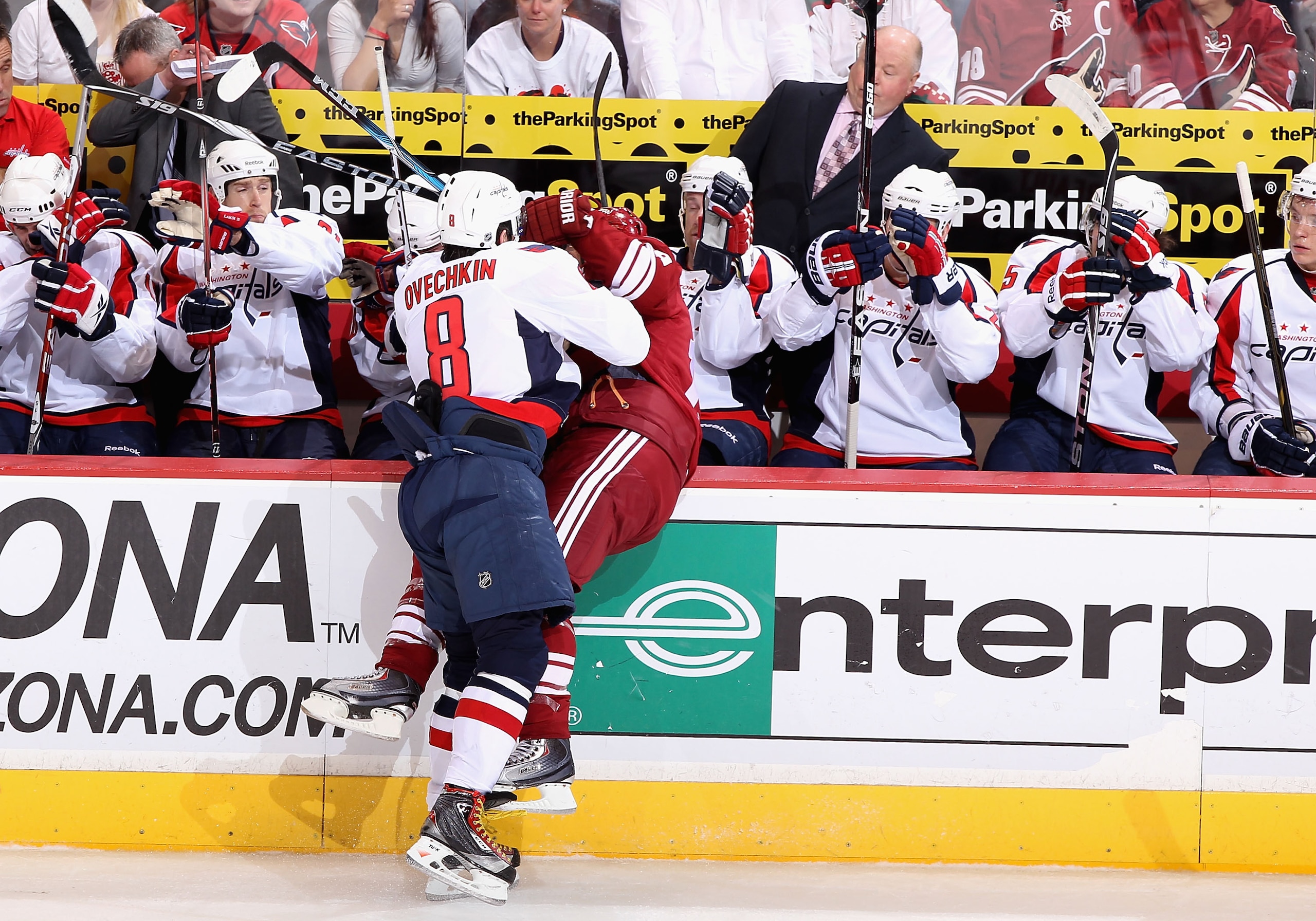 GLENDALE, AZ - FEBRUARY 14:  Alex Ovechkin #8 of the Washington Capitals lays a body check onto Shane Doan #19 of the Phoenix Coyotes during the NHL game at Jobing.com Arena on February 14, 2011 in Glendale, Arizona.  (Photo by Christian Petersen/Getty Im