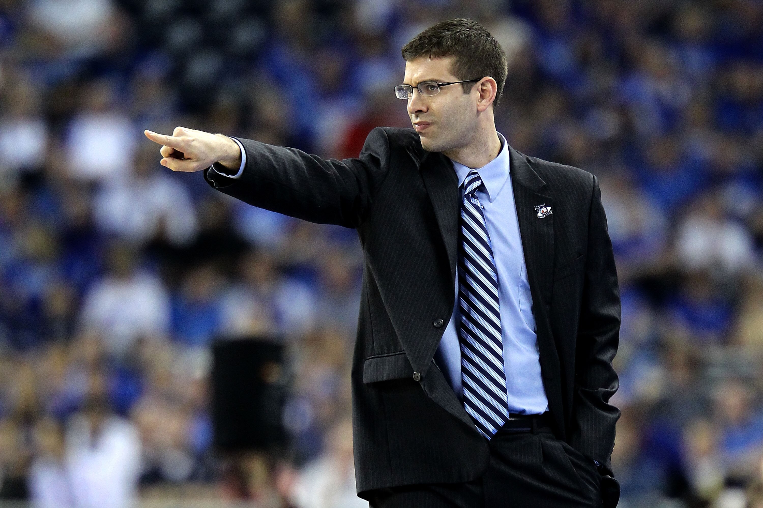 HOUSTON, TX - APRIL 02:  Head coach Brad Stevens of the Butler Bulldogs gestures from the sidelines against the Virginia Commonwealth Rams during the National Semifinal game of the 2011 NCAA Division I Men's Basketball Championship at Reliant Stadium on A