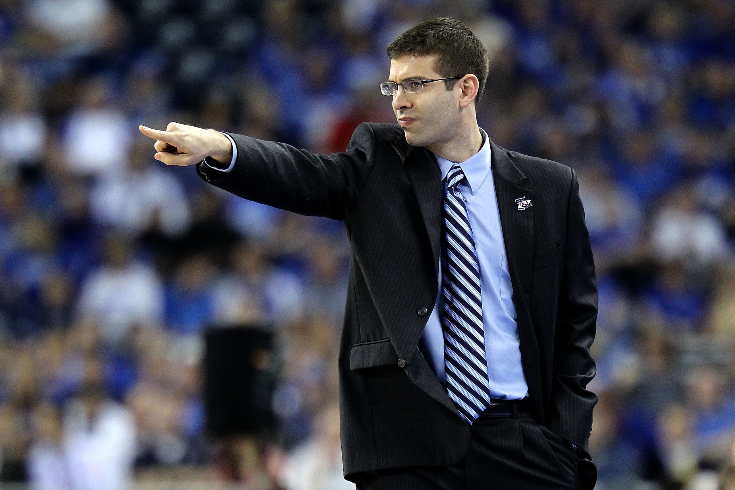 HOUSTON, TX - APRIL 02:  Head coach Brad Stevens of the Butler Bulldogs gestures from the sidelines against the Virginia Commonwealth Rams during the National Semifinal game of the 2011 NCAA Division I Men's Basketball Championship at Reliant Stadium on A