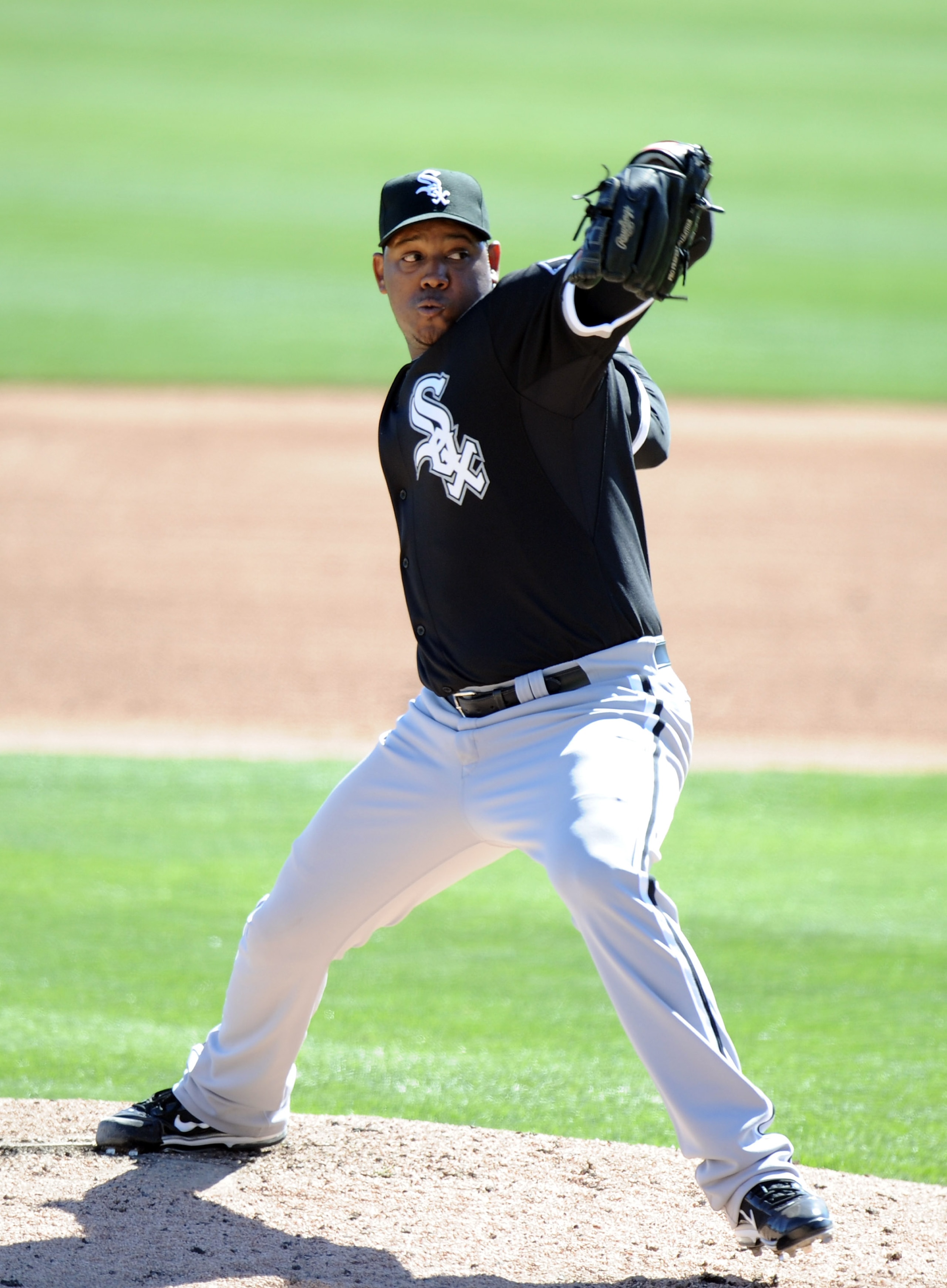 PHOENIX, AZ - FEBRUARY 28:  Tony Pena #57 of the Chicago White Sox pitches against the Los Angeles Dodgers during spring training at Camelback Ranch on February 28, 2011 in Phoenix, Arizona.  (Photo by Harry How/Getty Images)