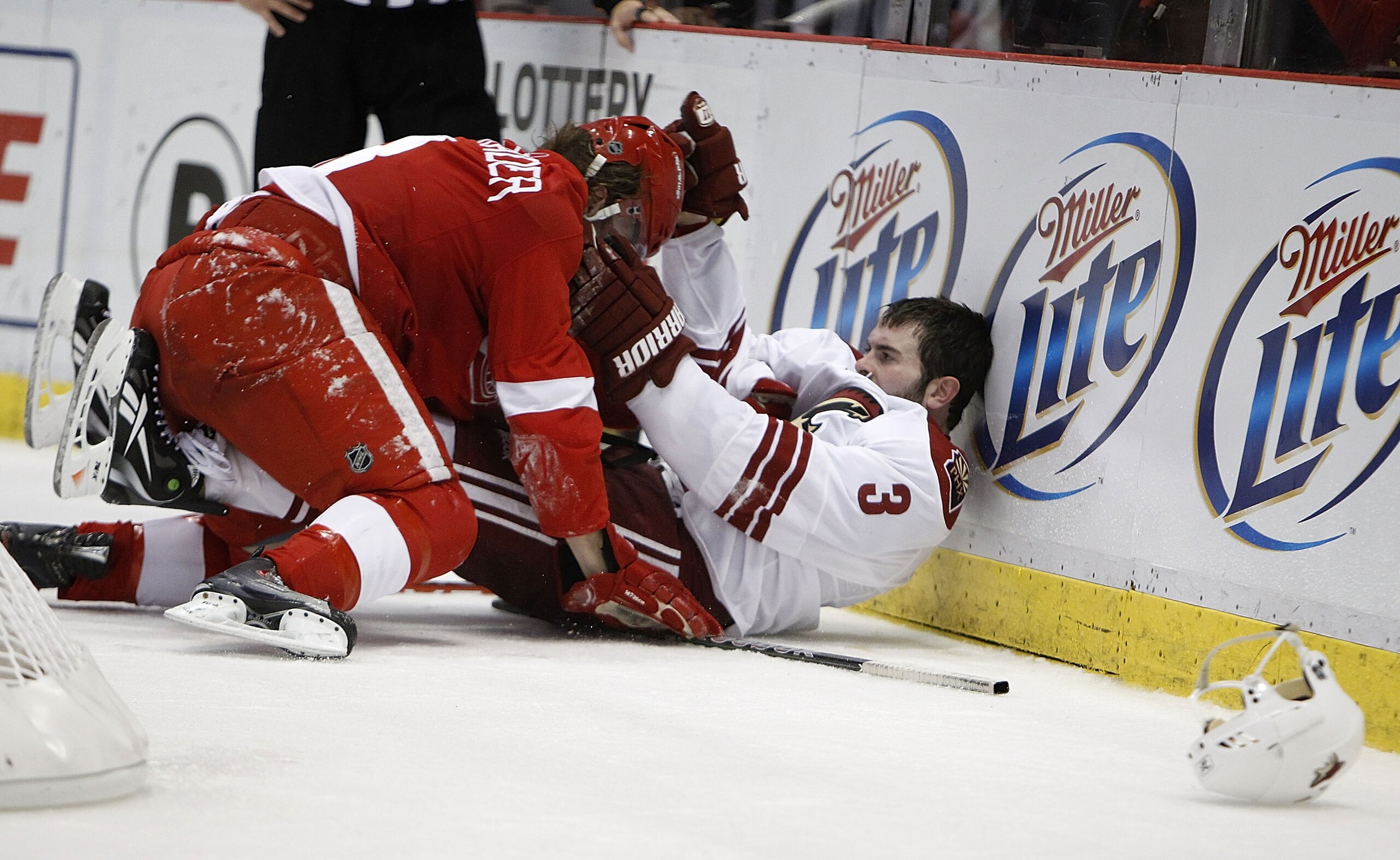 DETROIT - APRIL 25: Keith Yandle #3 of the Phoenix Coyotes fights with Justin Abdelkader #8 of the Detroit Red Wings during Game Six of the Western Conference Quarterfinals of the 2010 NHL Stanley Cup Playoffs on April 25, 2010 at Joe Louis Arena in Detro