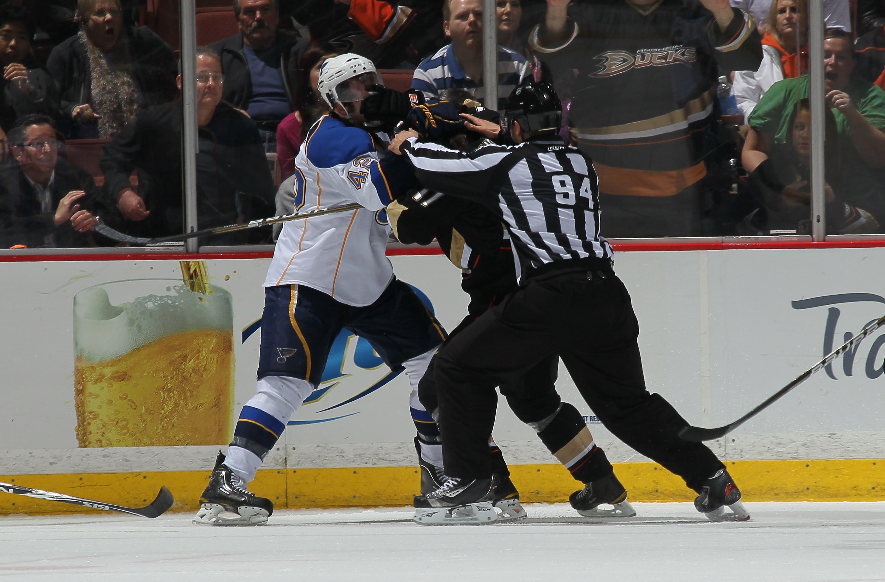 ANAHEIM, CA - MARCH 16: Linesman Bryan Pancich breaks up a fight between David Backes #42 of the St. Louis Blues and Lubomir Visnovsky #17 of the Anaheim Ducks at Honda Center on March 16, 2011 in Anaheim, California.  Anaheim won 2-1.   (Photo by Stephen