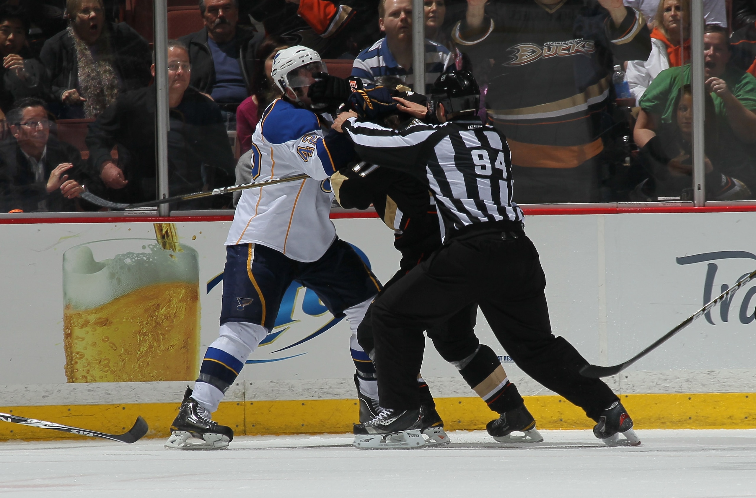 ANAHEIM, CA - MARCH 16: Linesman Bryan Pancich breaks up a fight between David Backes #42 of the St. Louis Blues and Lubomir Visnovsky #17 of the Anaheim Ducks at Honda Center on March 16, 2011 in Anaheim, California.  Anaheim won 2-1.   (Photo by Stephen