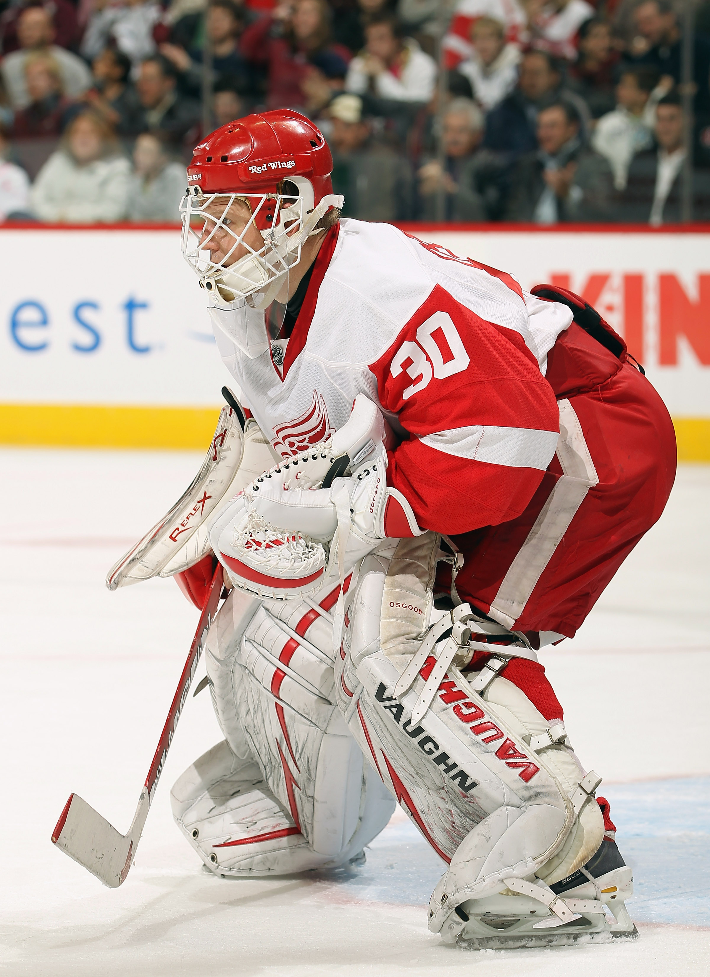 DENVER - DECEMBER 27:  Goalie Chris Osgood #30 of the Detroit Red Wings defends the goal against the Colorado Avalanche at the Pepsi Center on December 27, 2010 in Denver, Colorado. Osgood earned his 400th win and collected 46 saves as the Red Wings defea