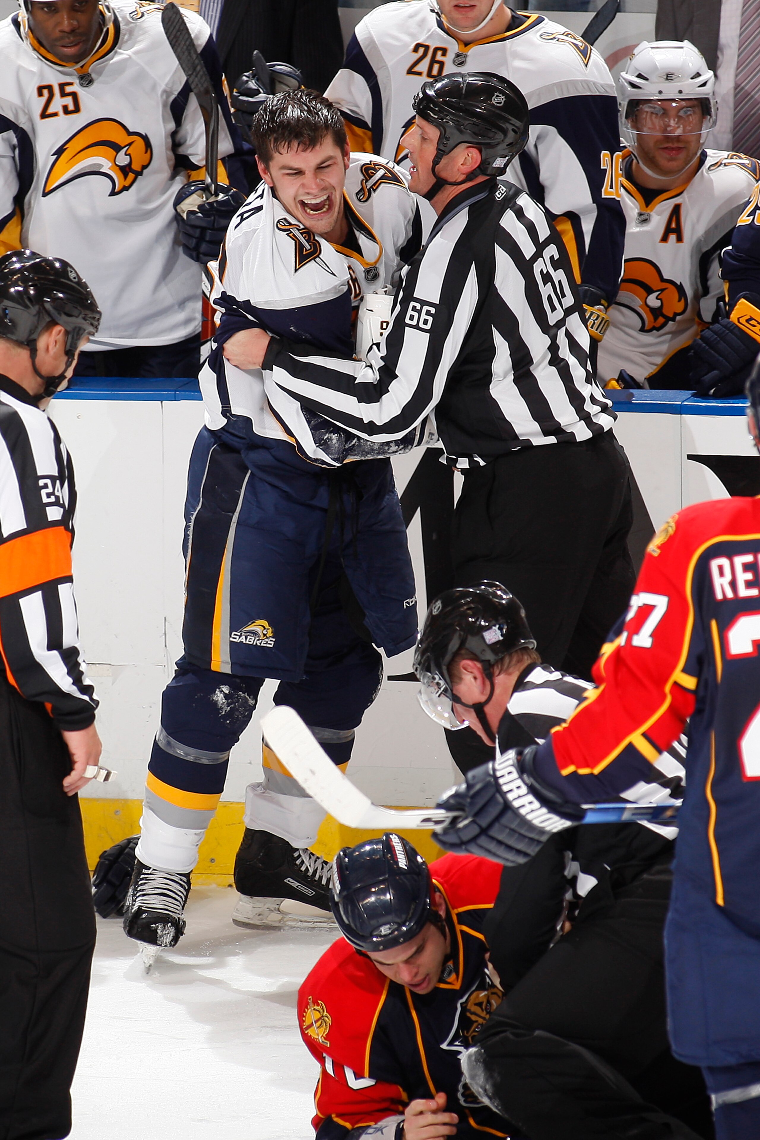 SUNRISE, FL - OCTOBER 21: Patrick Kaleta #36 of the Buffalo Sabres yells at David Booth #10 of the Florida Panthers who is held down after a fight in the third period on October 21, 2009 at the BankAtlantic Center in Sunrise, Florida. The Sabres defeated